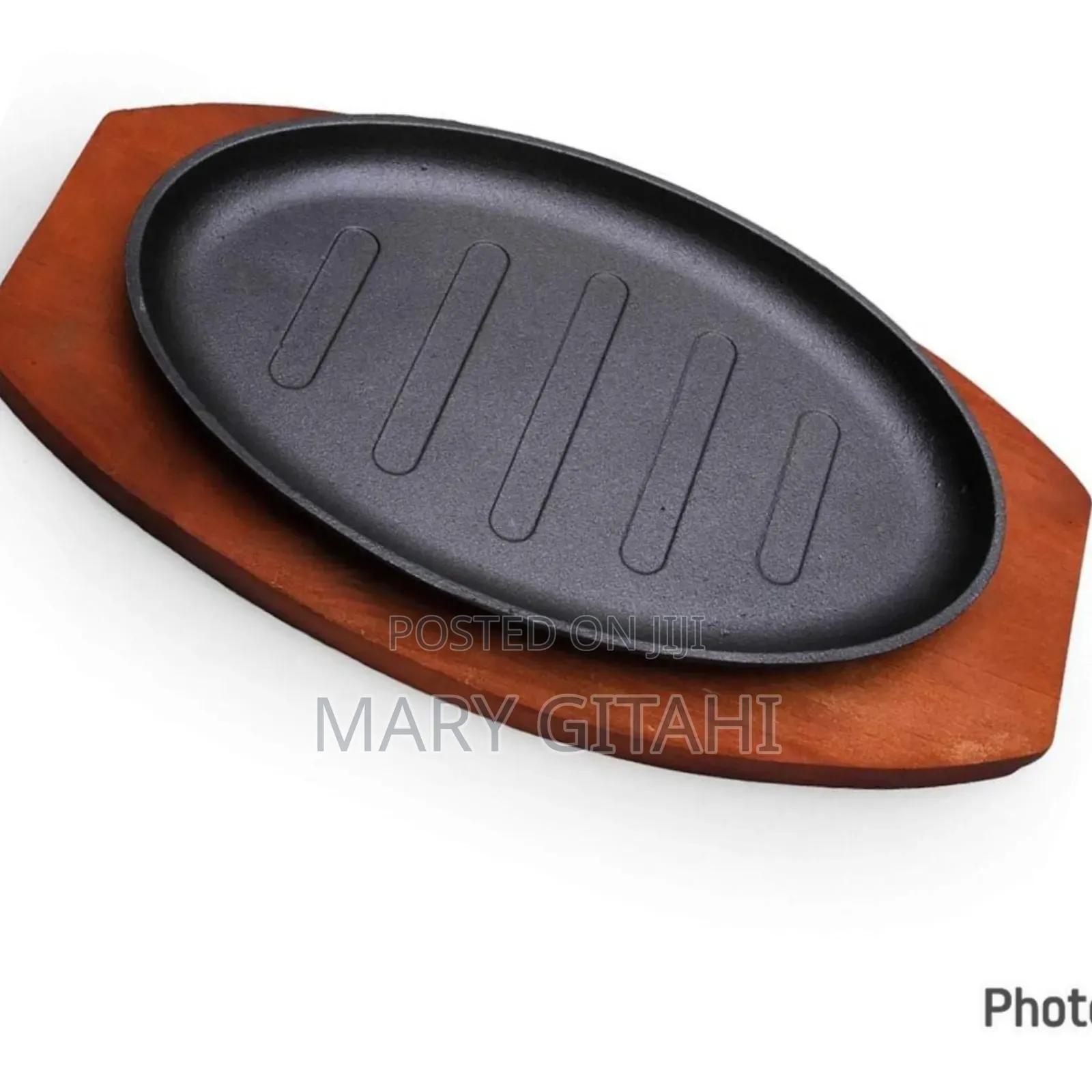 Oval Cast Iron Hot Sizzling Plate on Wooden Tray