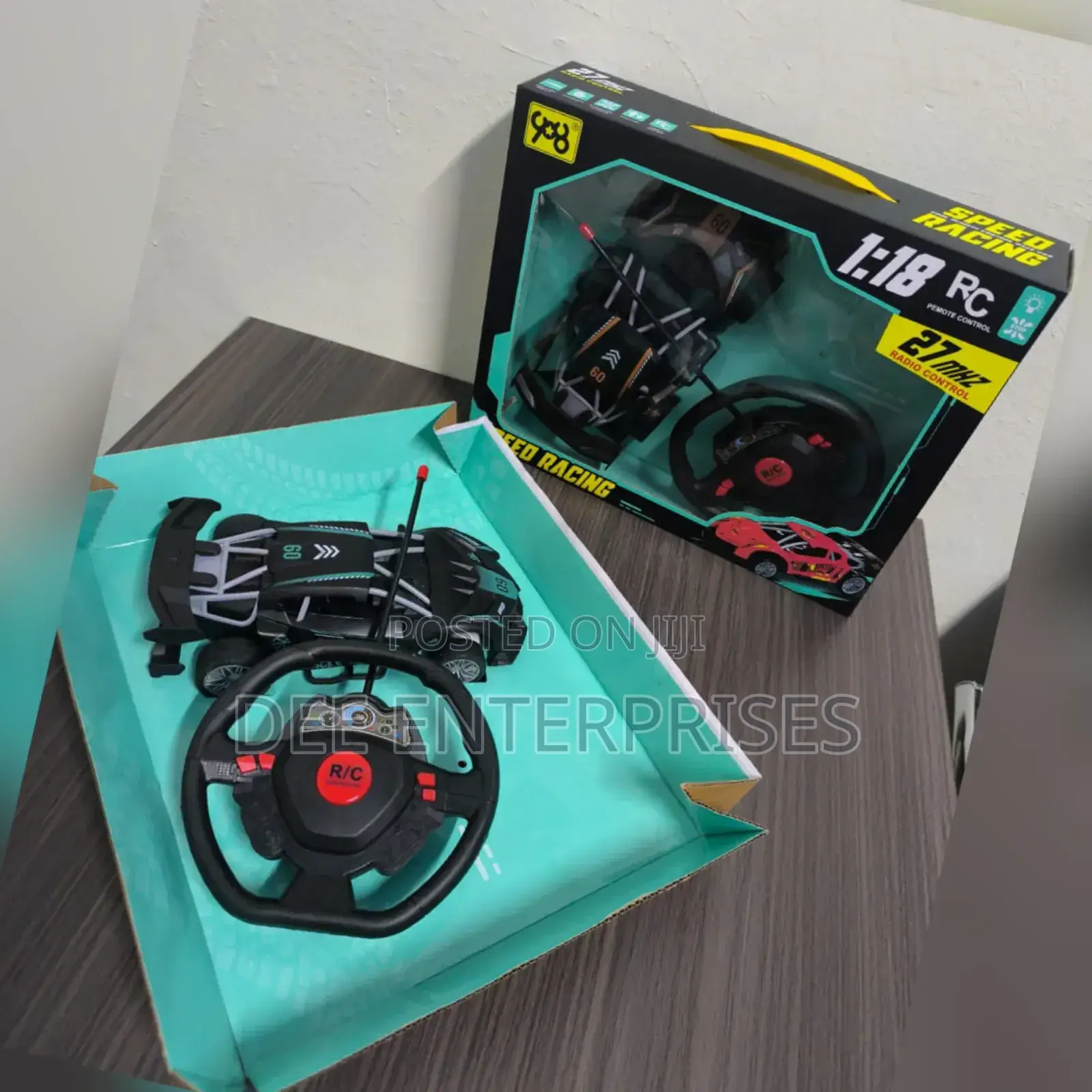 Remote-Controlled Toy Car With a Steering Wheel Controller.