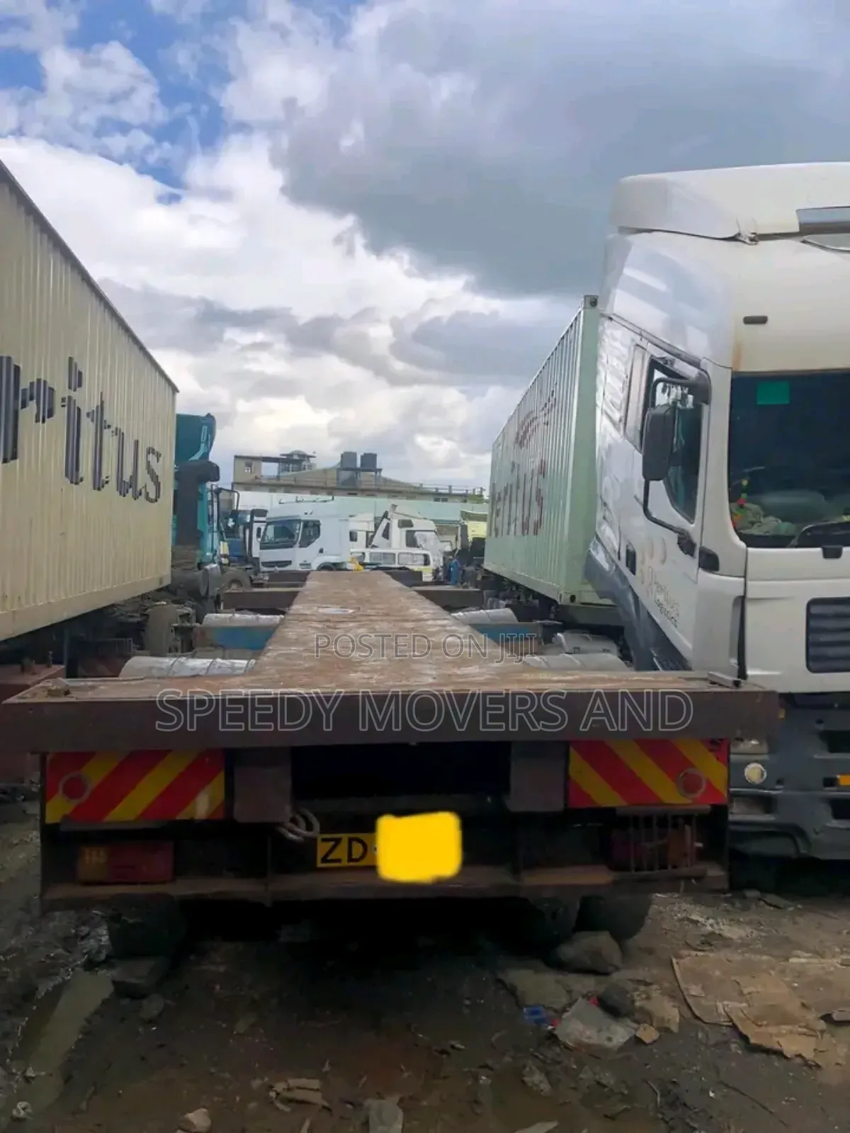 Highsided, Flatbed Trailers Available for Load Delivery