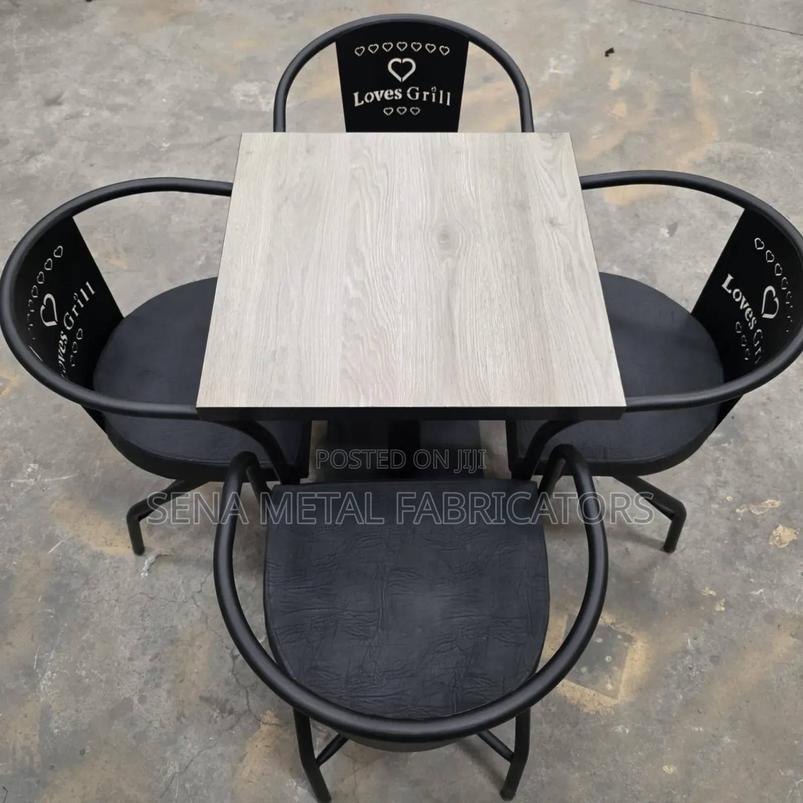 Black Restaurant Dining Set With Brown Table.