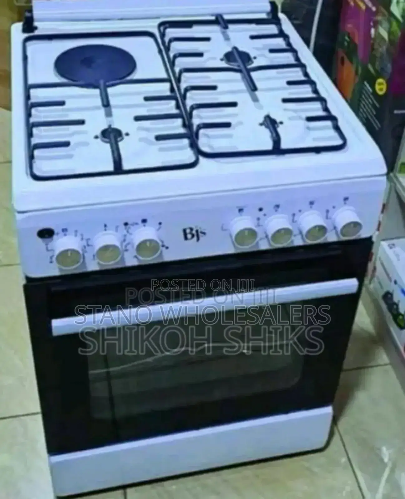 White BJS 60by60 Standing Cooker. Electric Oven. Electric Plates