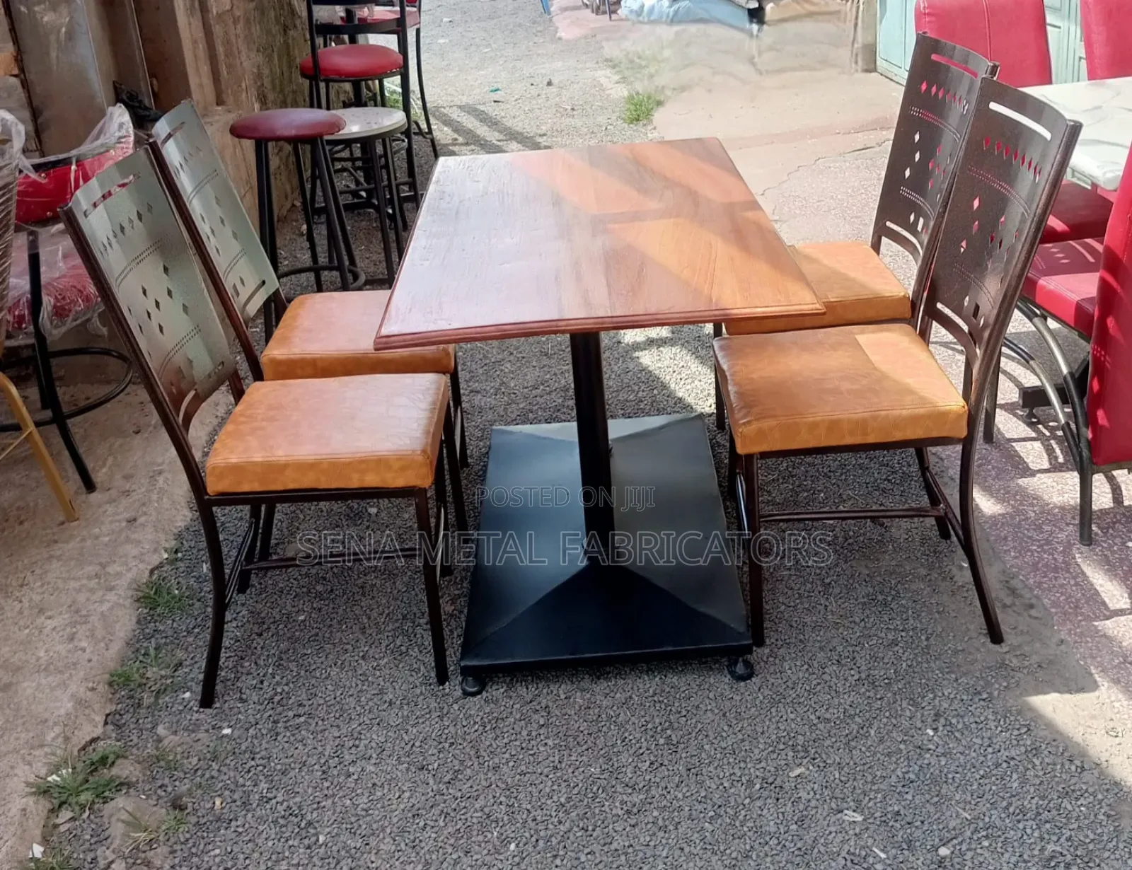 Mahogany Restaurant Set With Laser-Cut Design Chairs.