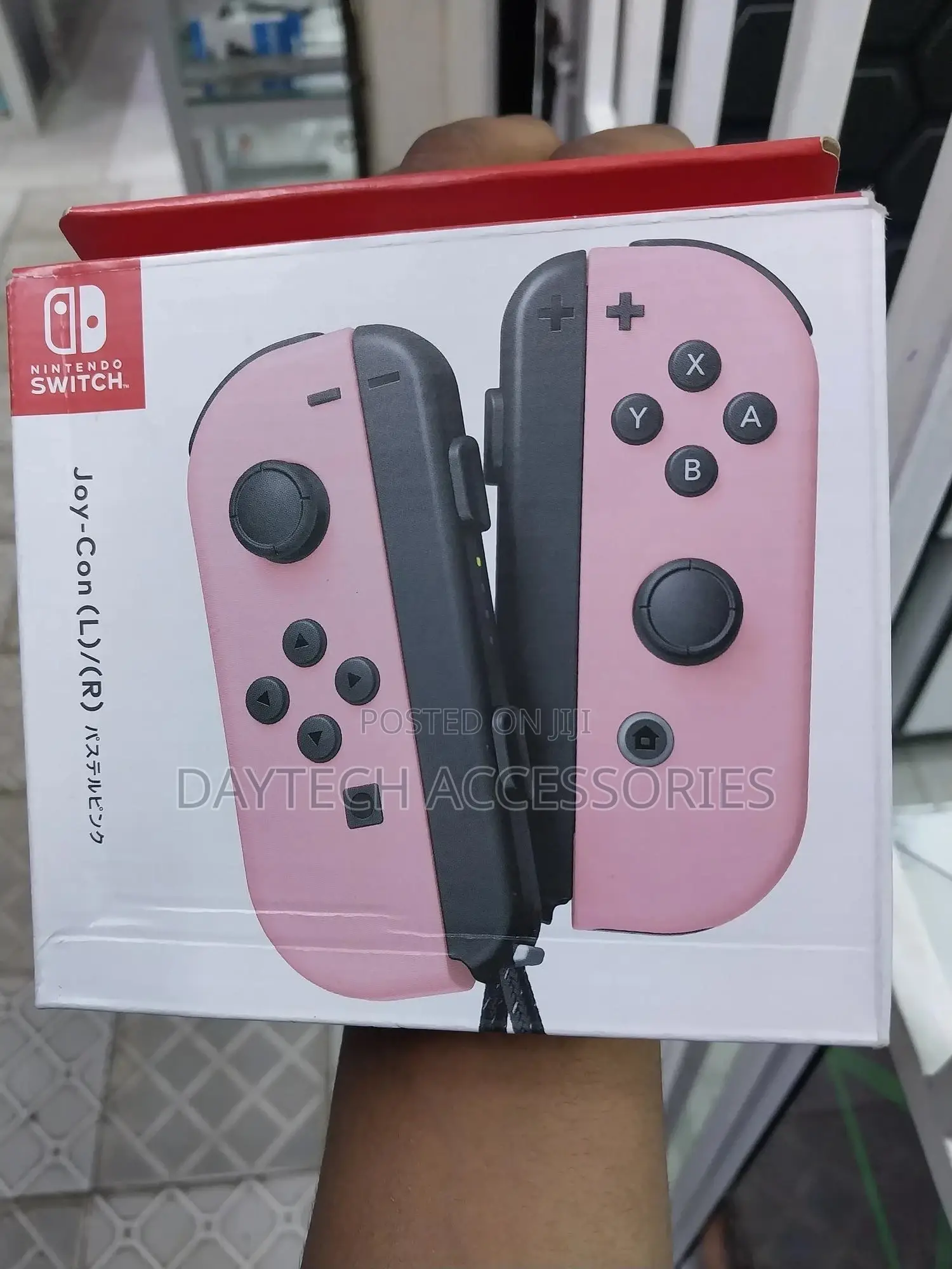 Nintendo Switch Joy-Con (L)/(R) Controllers in Pastel Pink.