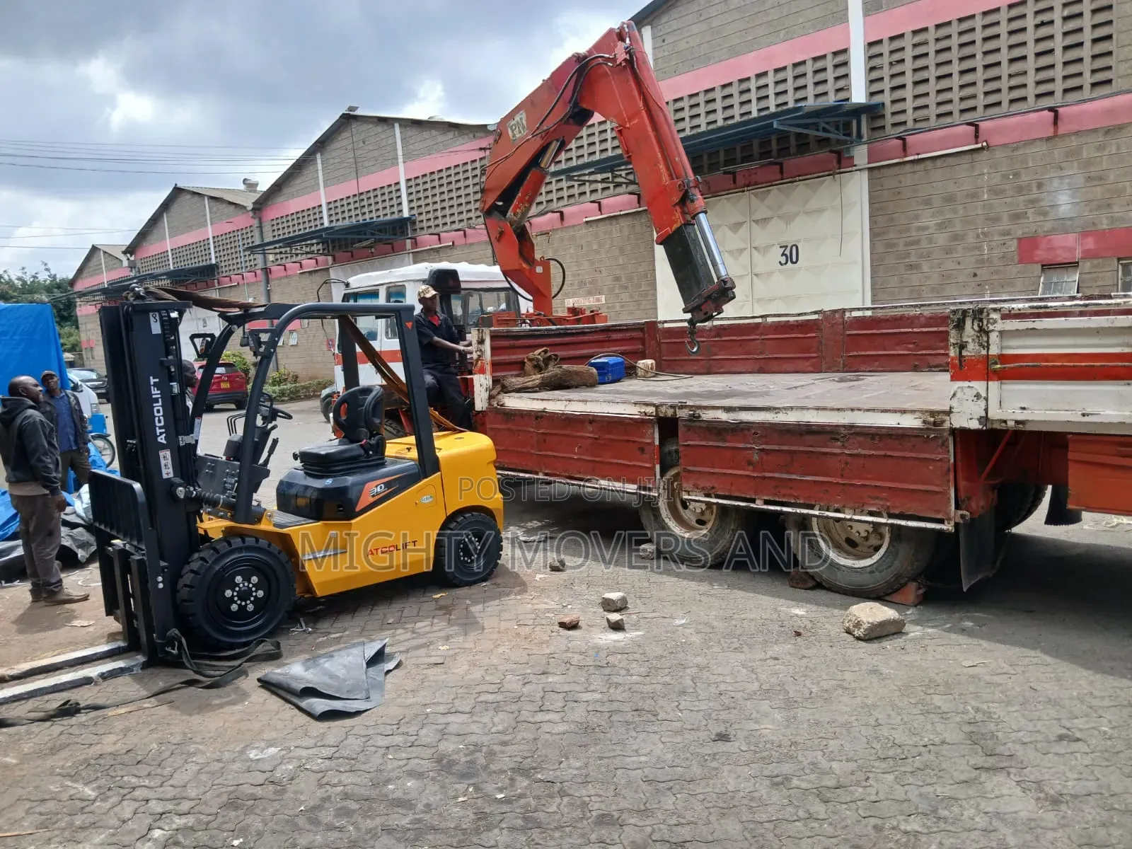 Flatbed Trailer With Crane Are Ready for Transportation