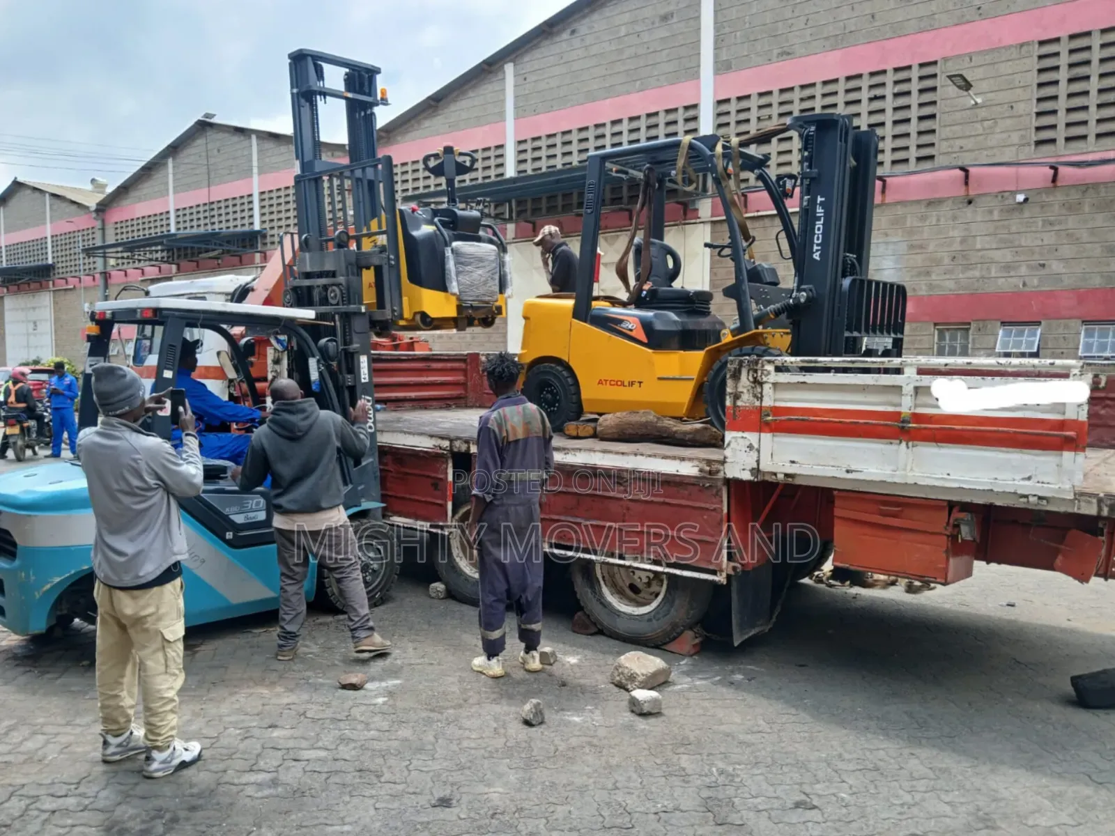 Flatbed Trailer With Crane Are Ready for Across Border Transportation