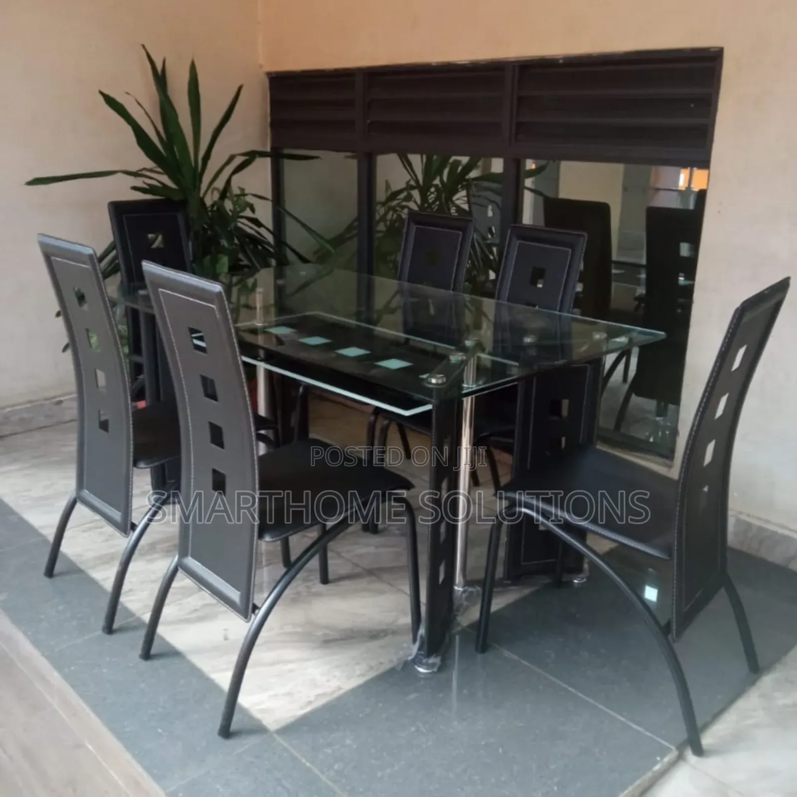 Executive 6 Sitter Glass Dinning Table With Leather Seat