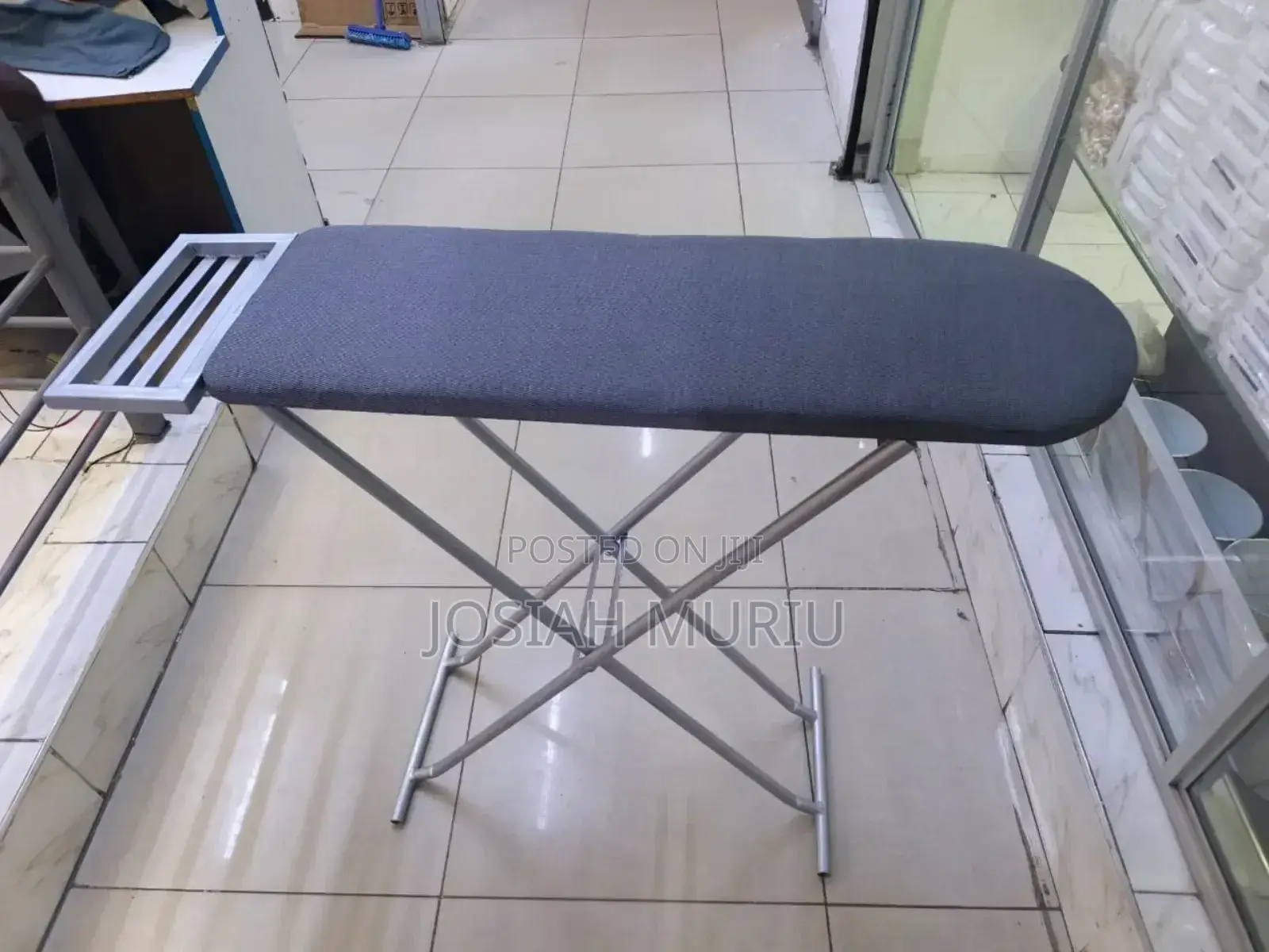 Sturdy Metallic Ironing Board With Adjustable Height
