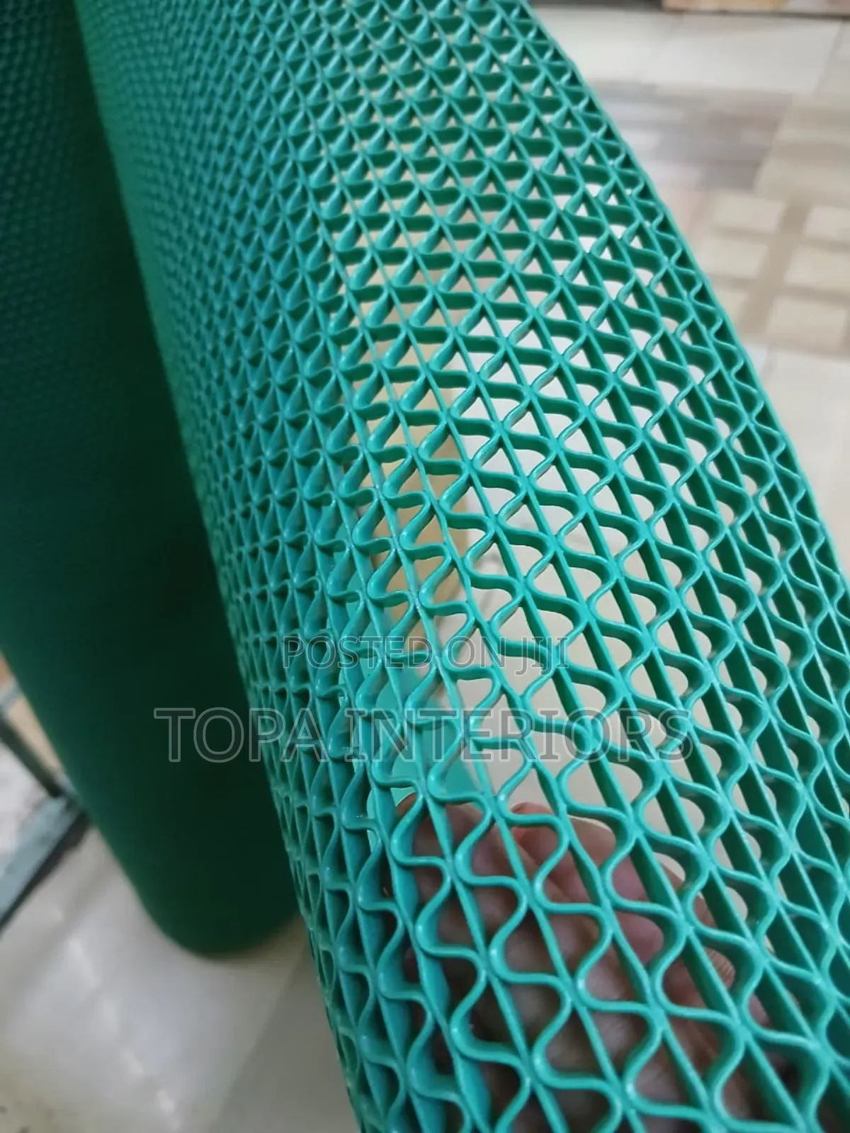 Green Perforated Outdoor and Indoor Rugs That Are Water Resistant