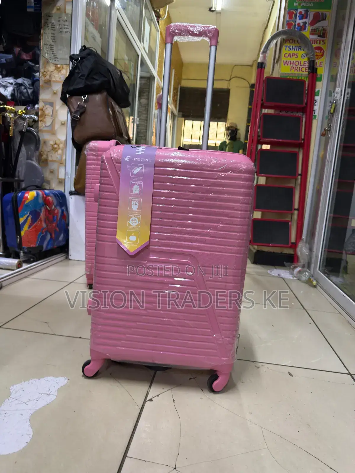 Pink Medium Size Rubber Suitcases 
Height 60cm