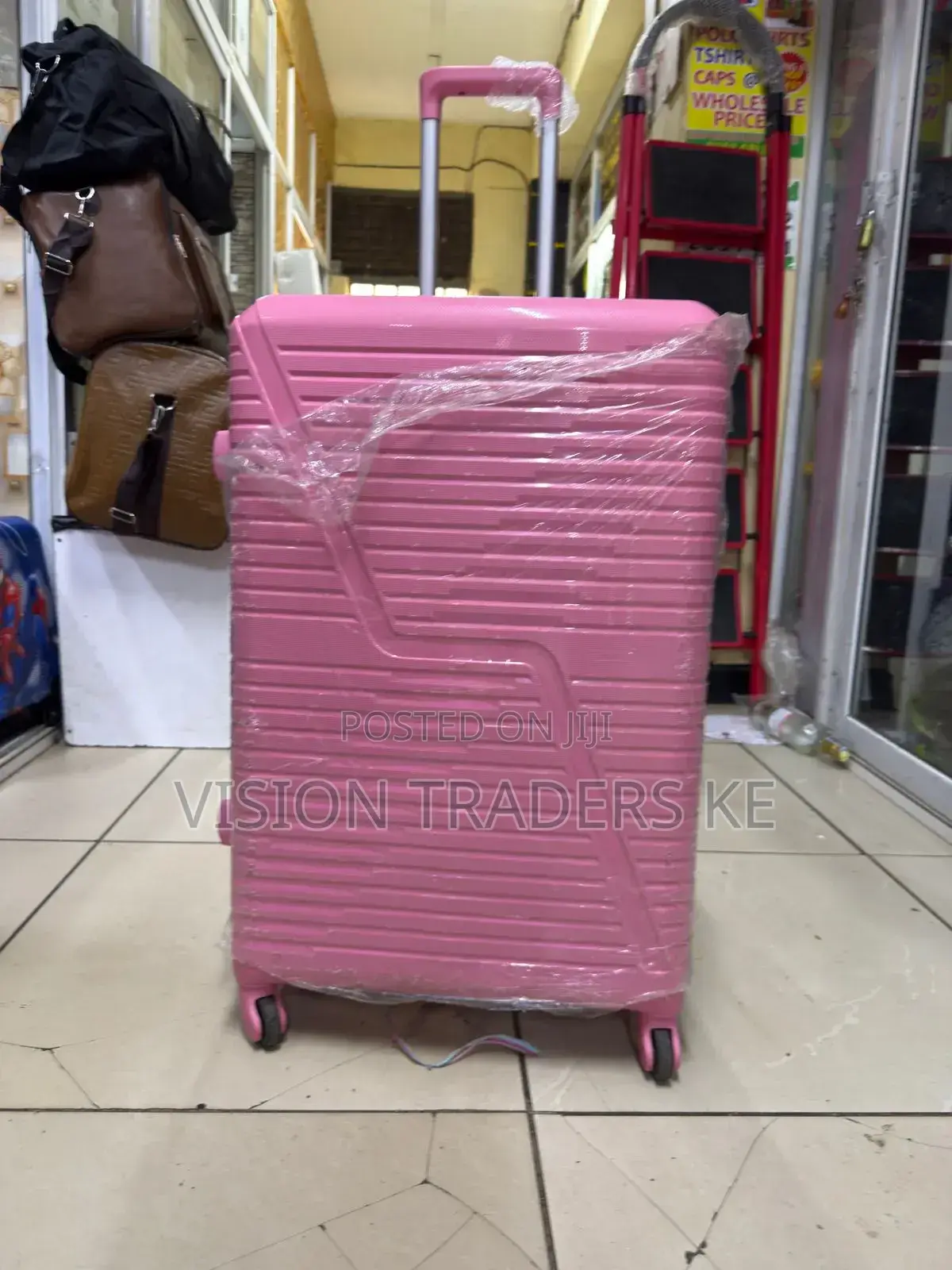 Pink Large Size Rubber Suitcase 
Height 69cm
