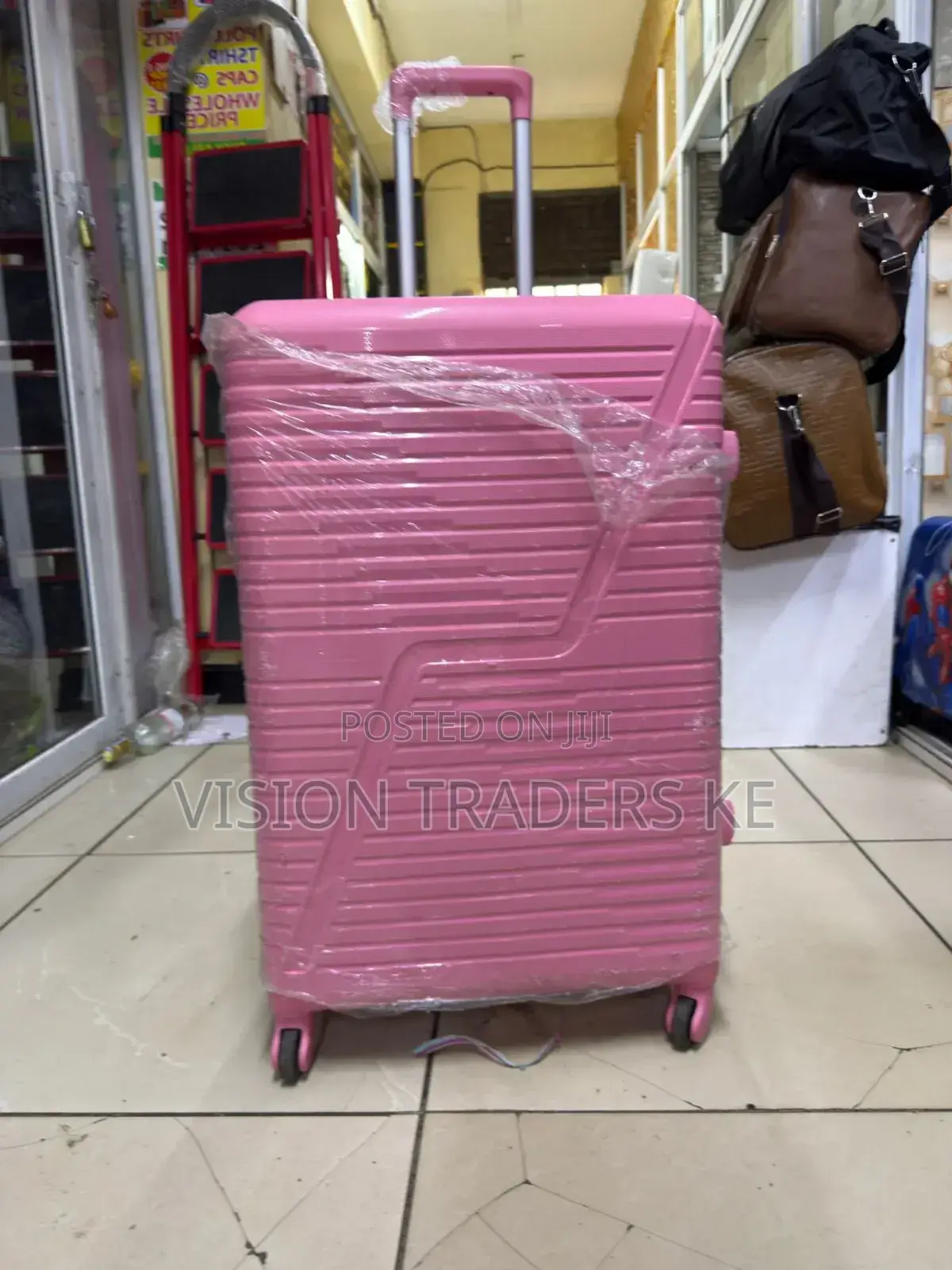Pink Large Size Rubber Suitcase 
Height 69cm