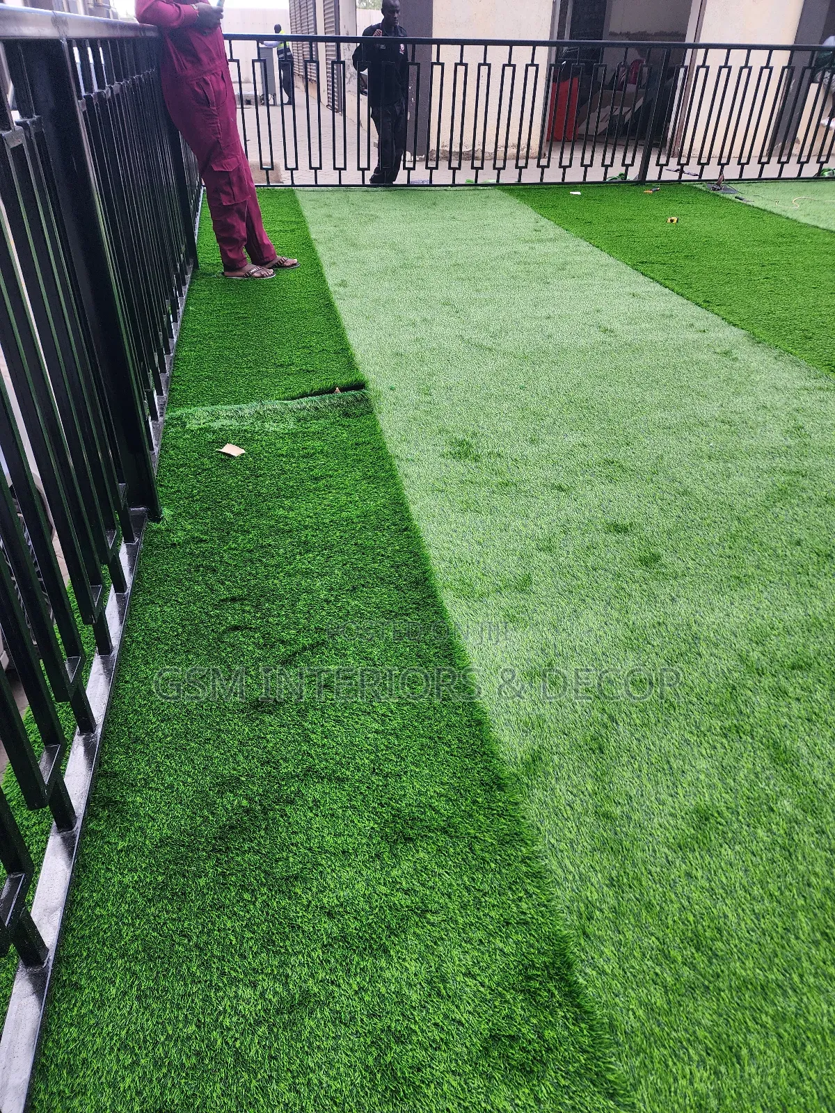 Artificial Green Grass Carpets in Grilled Field