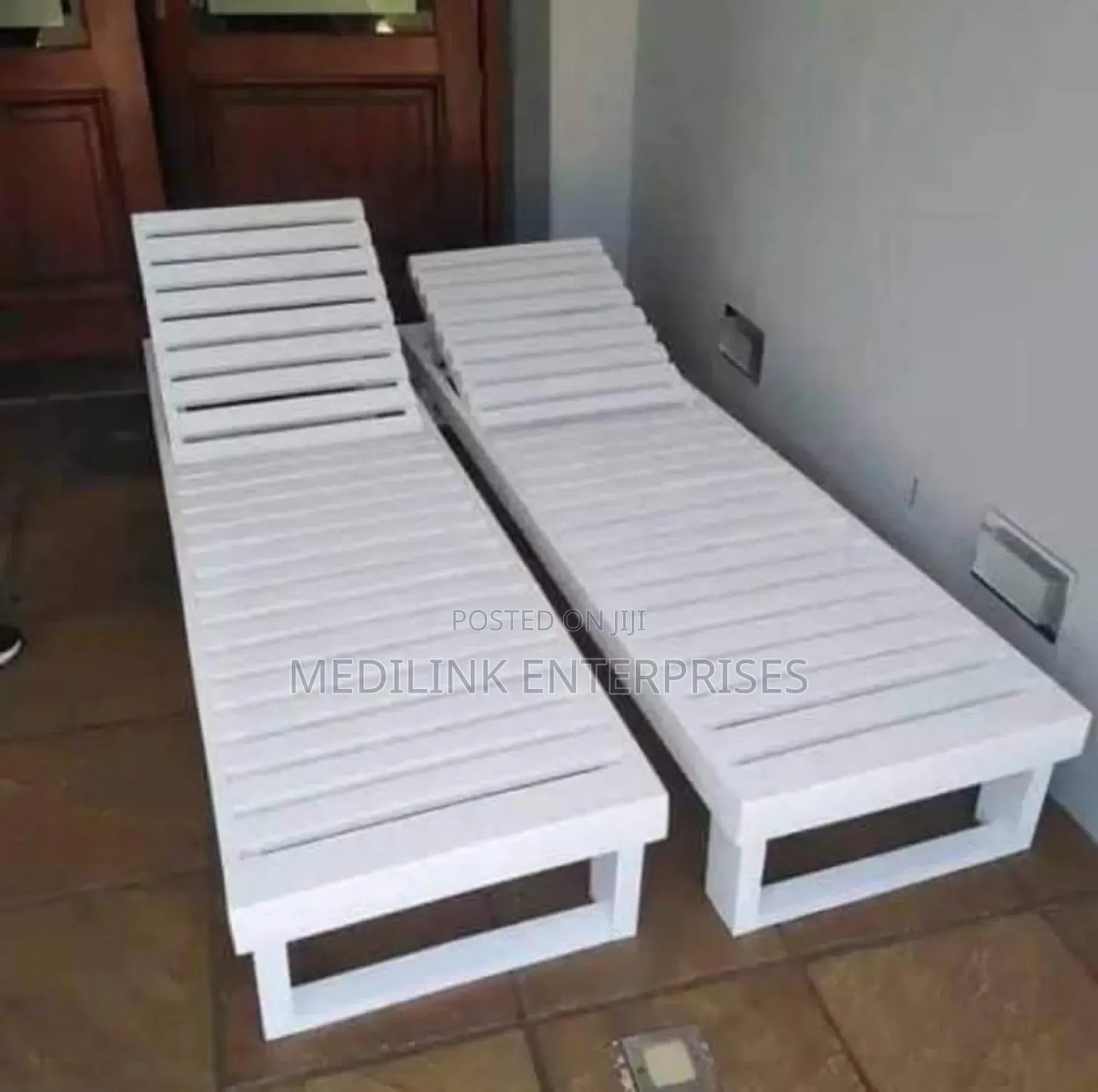 Whitish Wooden Sunbeds Beach Side