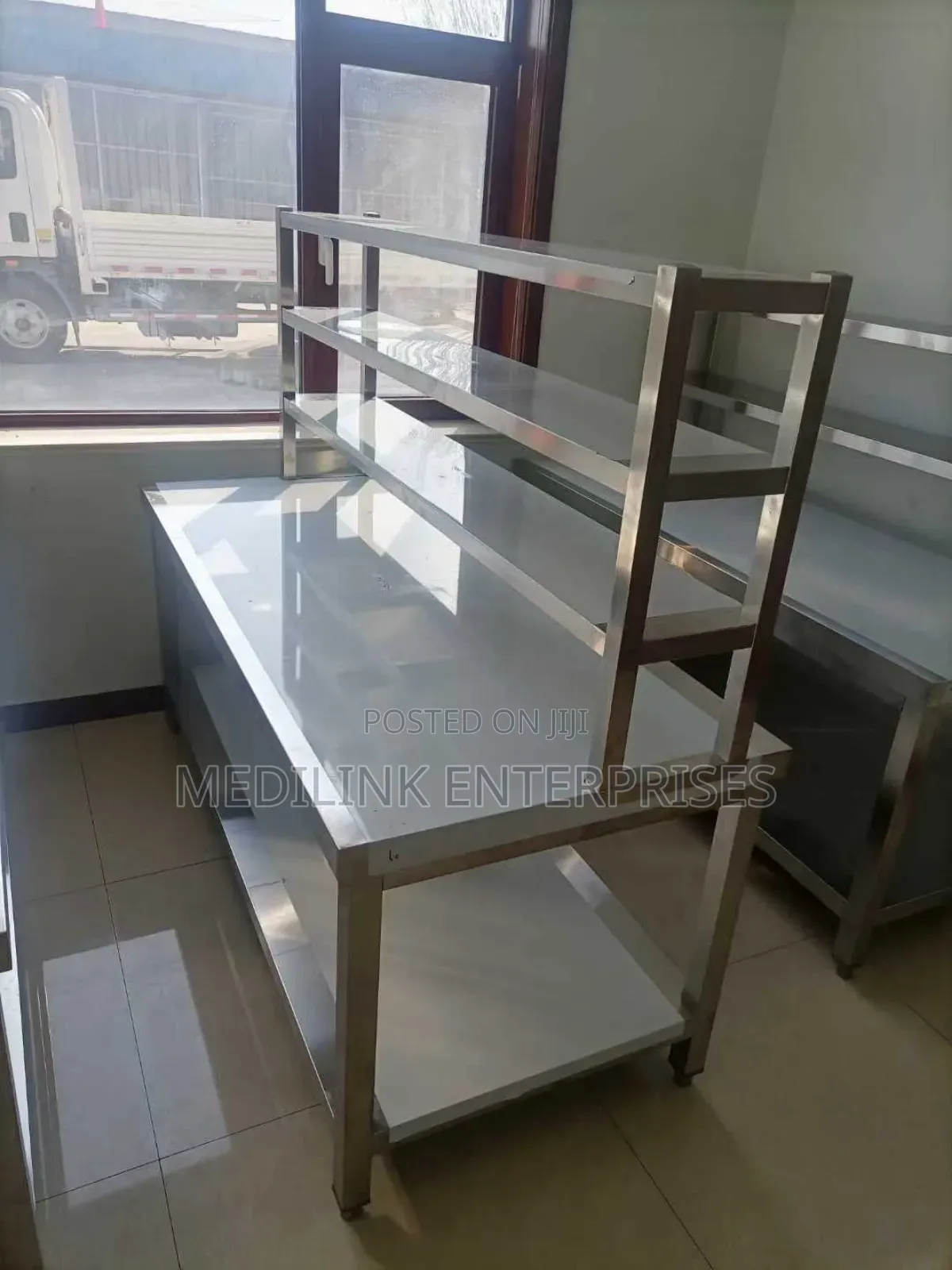 Commercial Kitchen Working Table Customized With a Service Rack