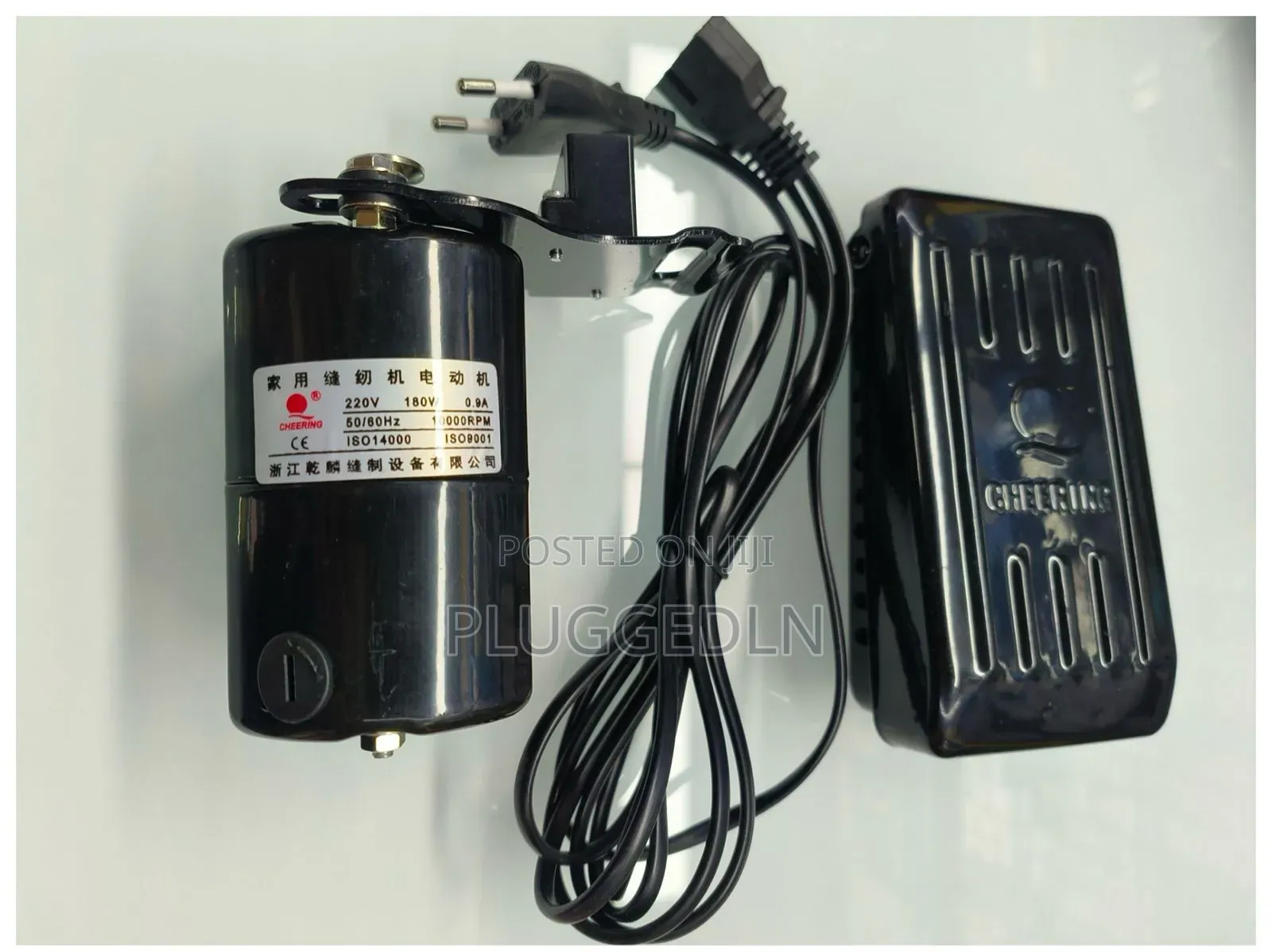 Cheering Domestic Sewing Machine Motor With a Foot Pedal Controller.