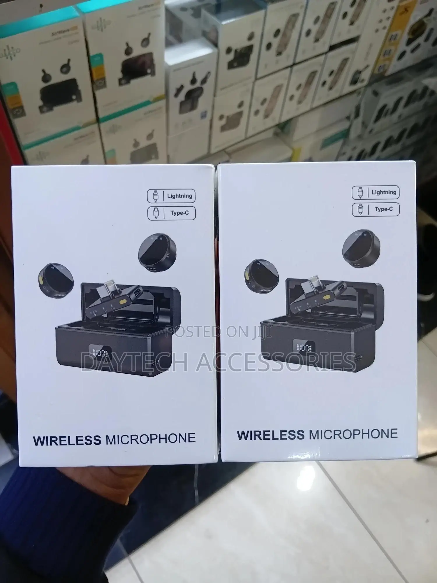 Wireless Lavalier Microphones With Charging Cases.