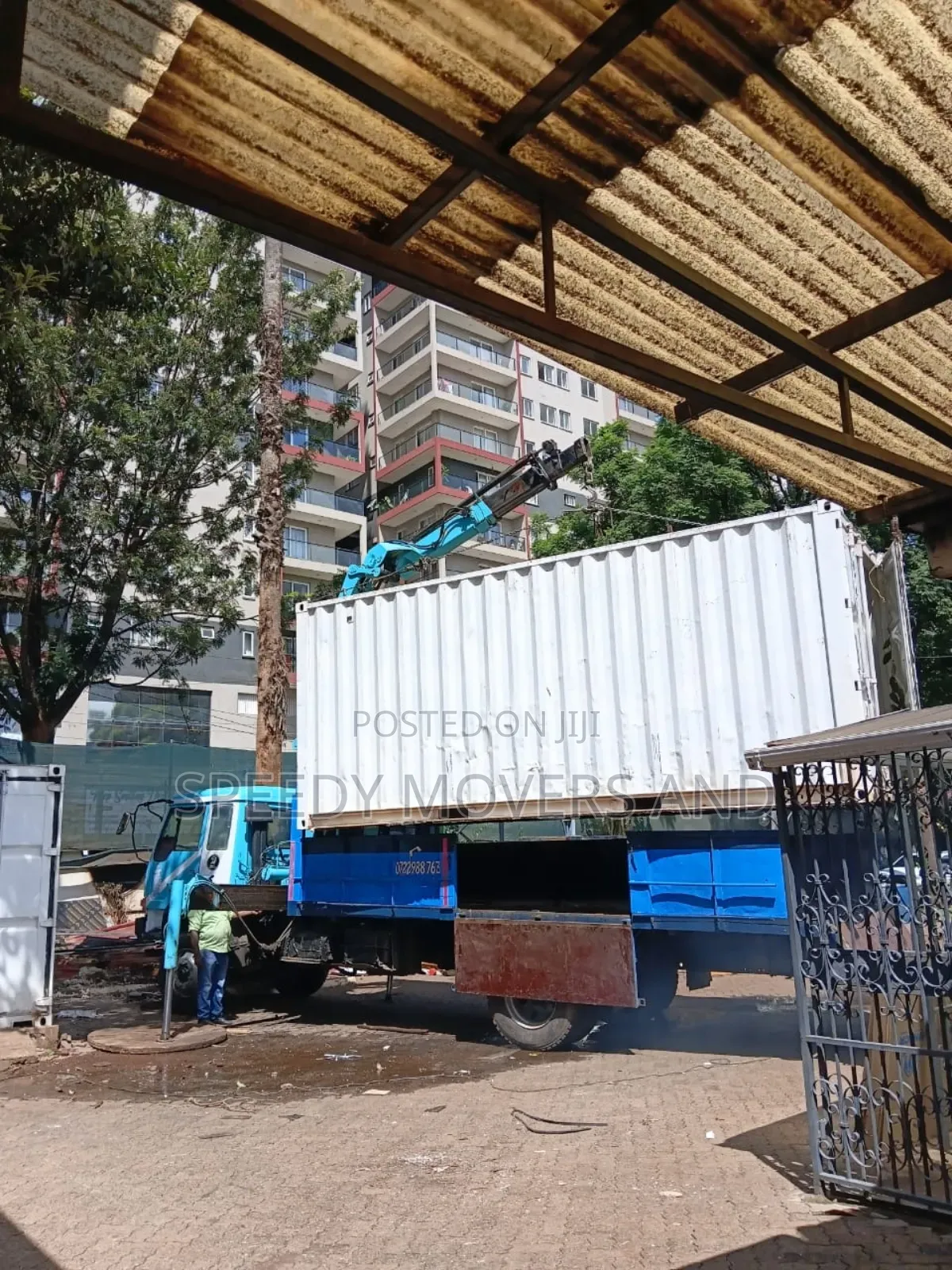Trucks With Uplifting Cranes Are Available for Jobs and Delivery