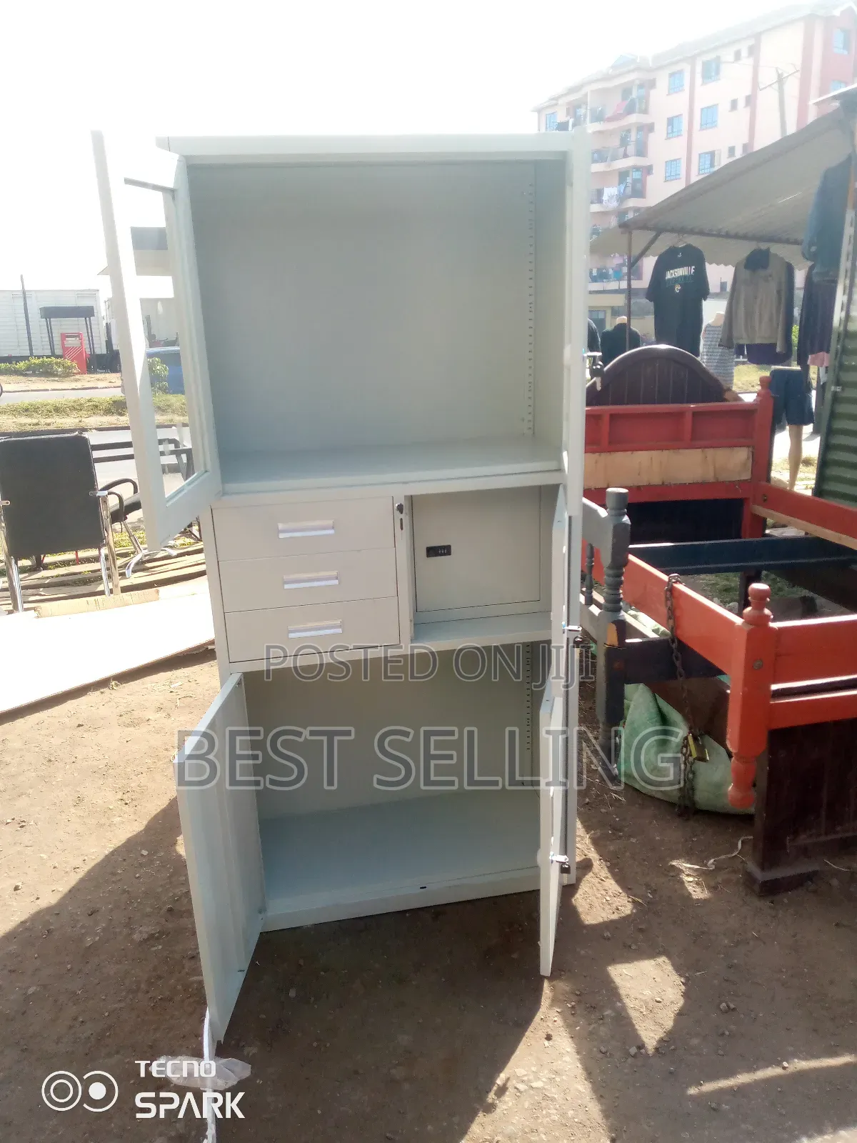 Opened White File Cabinet With Safe Box