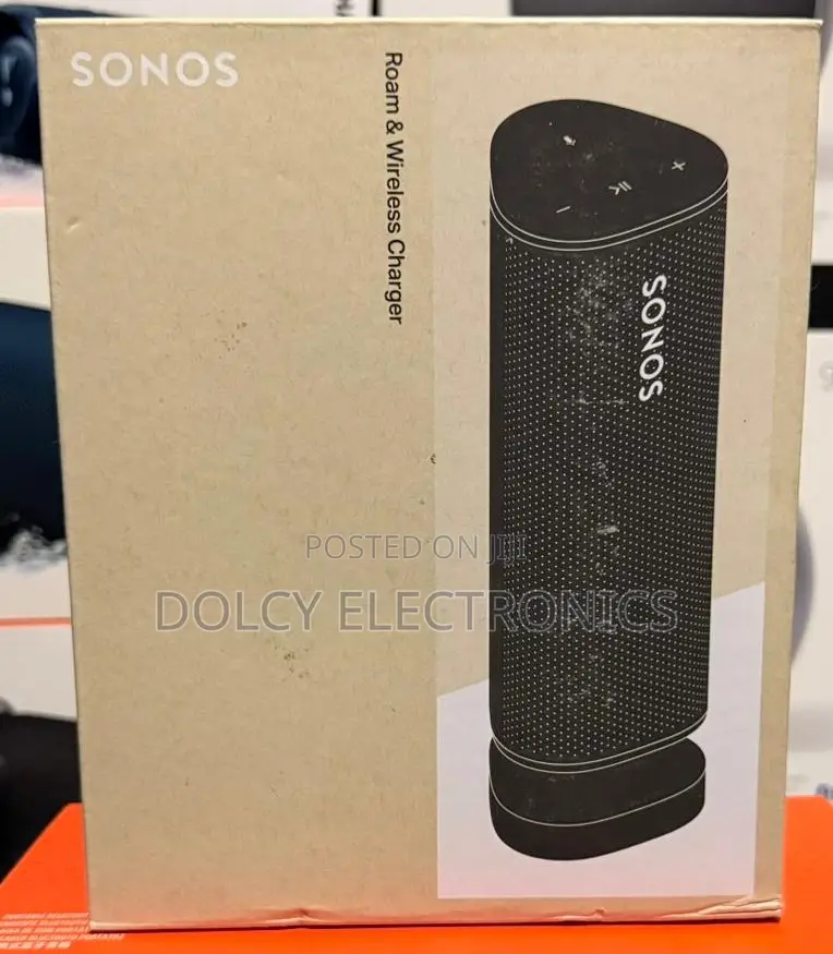 Sonos Speaker Roam And Wireless Charger.