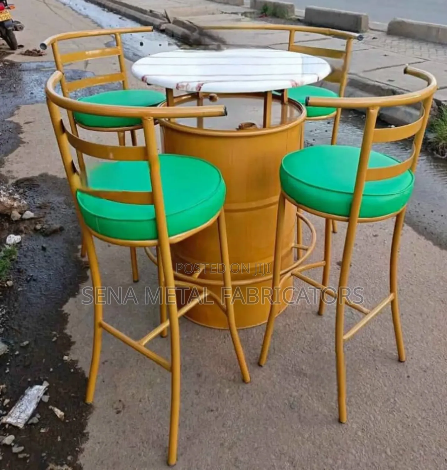 Drum Set With Green Bar Stools.
