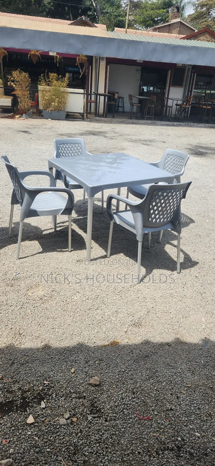 Silver Plastic Table With Metal Legs + Plastic Chairs With Metal Legs