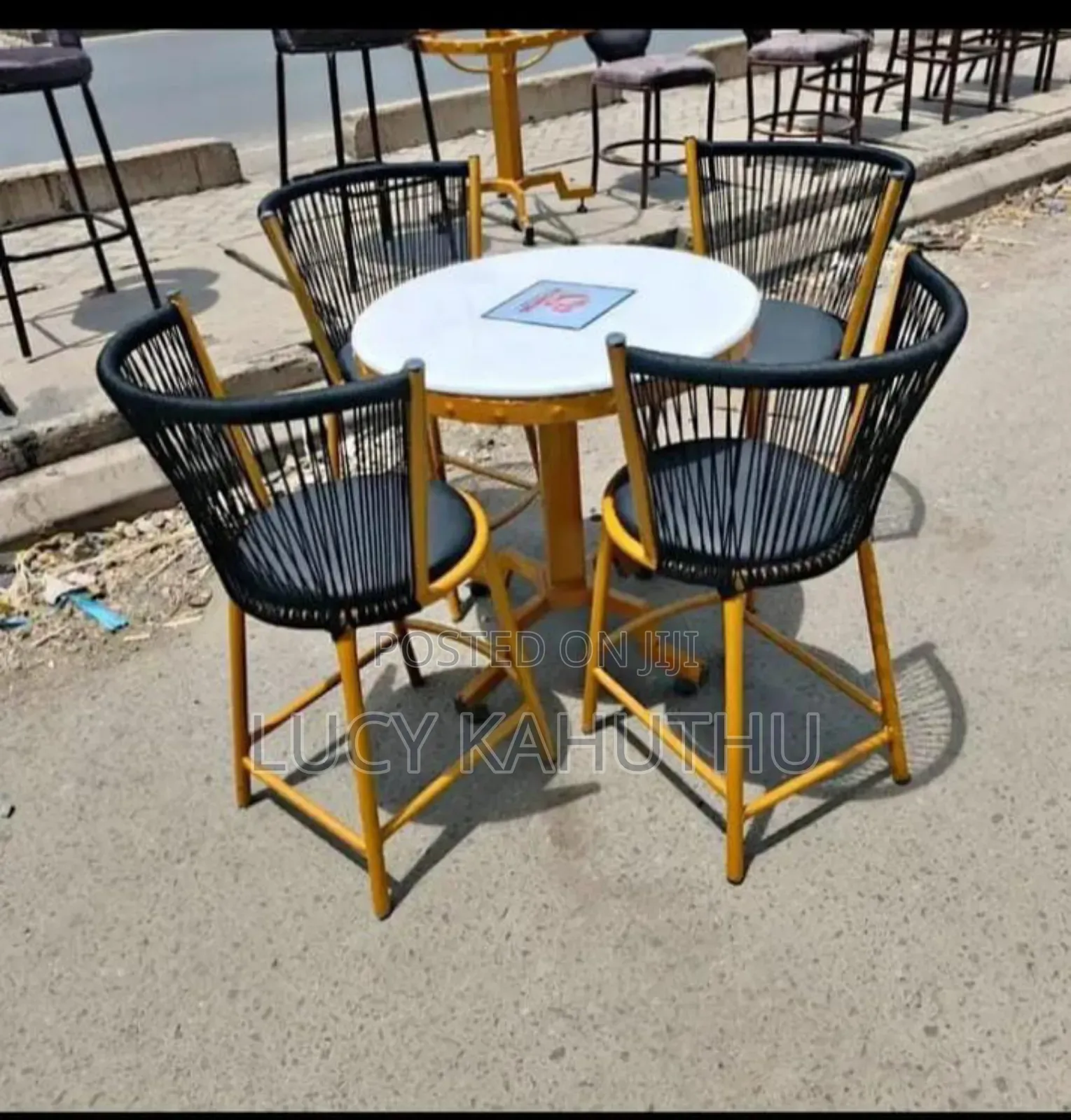 Woven Chairs With Powder Coated Marble Table