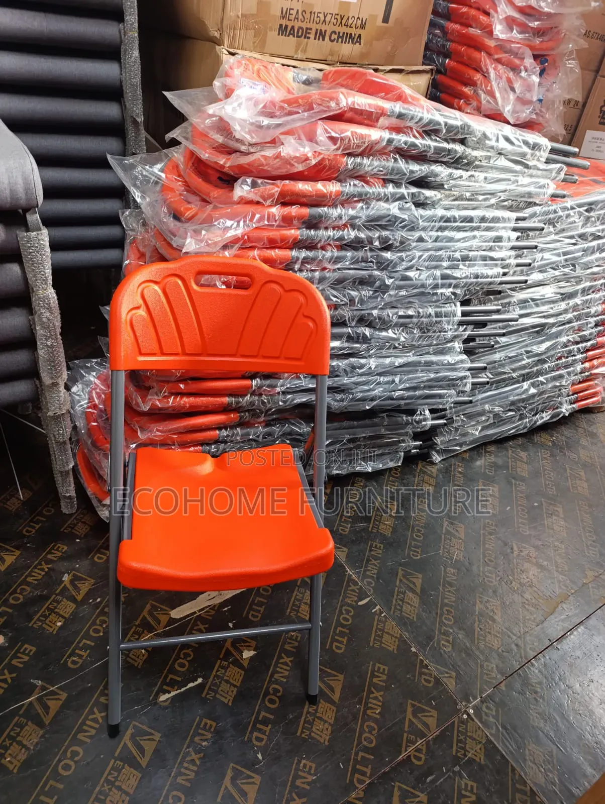 Orange Plastic and Metal Folding Chairs