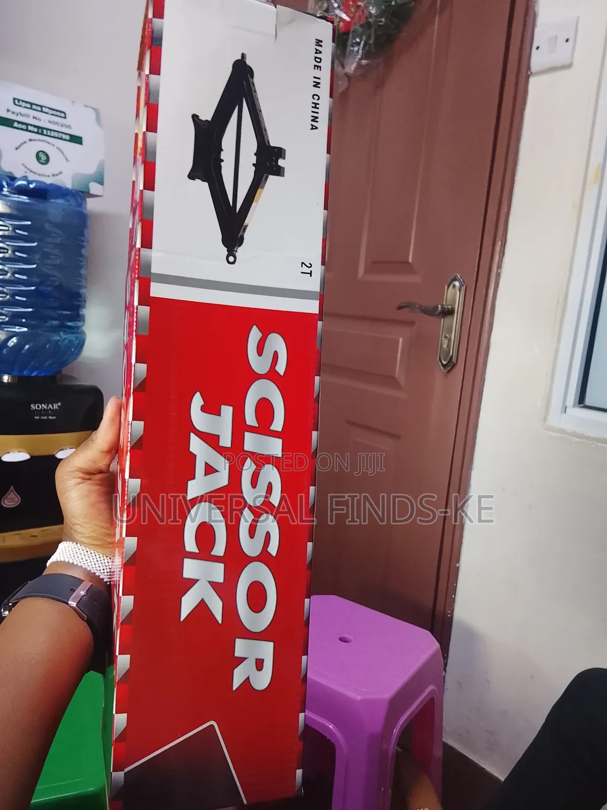A Metallic Scissor Jack With 2 Ton