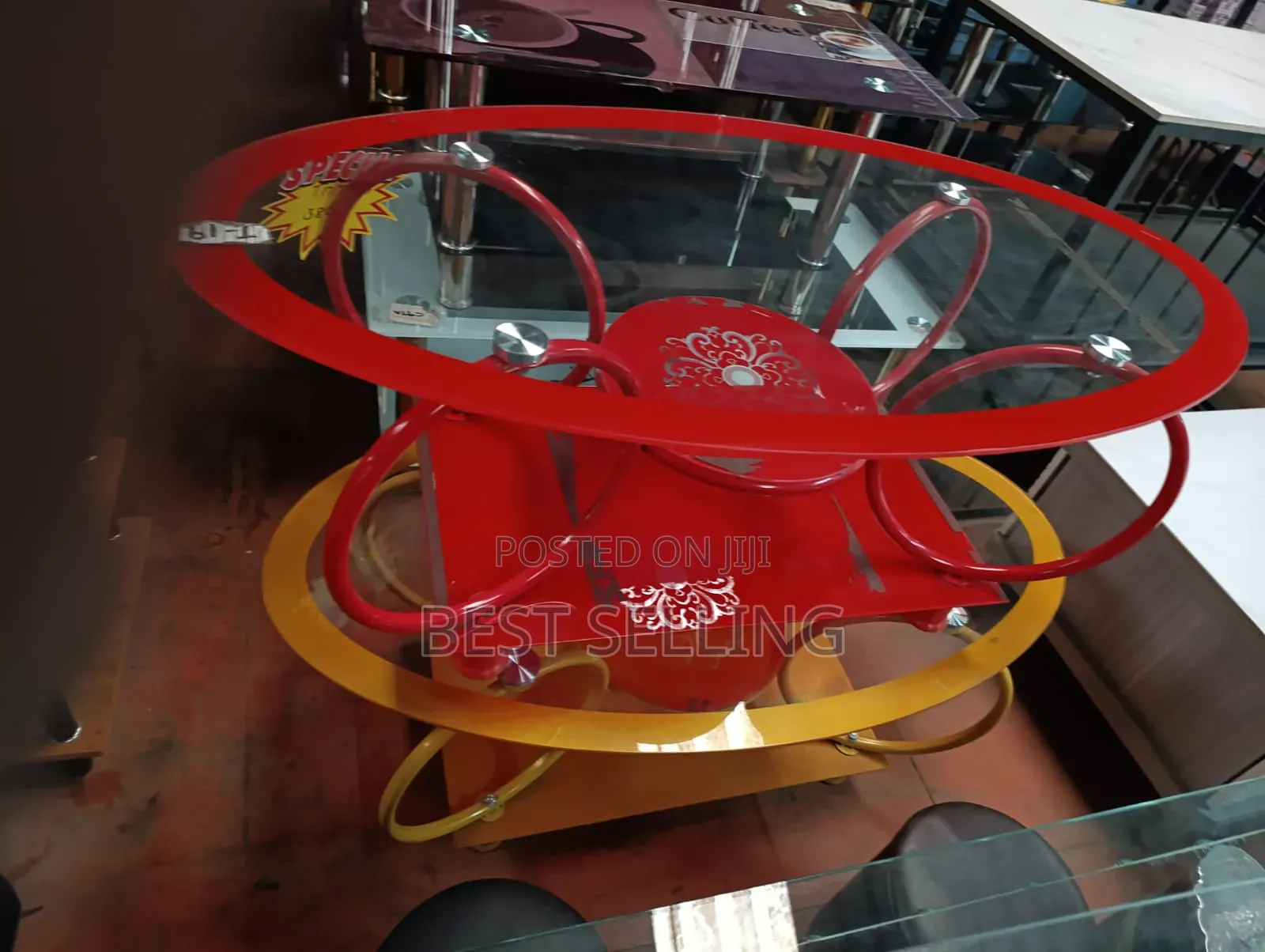 Red Oval Glass Coffee Table