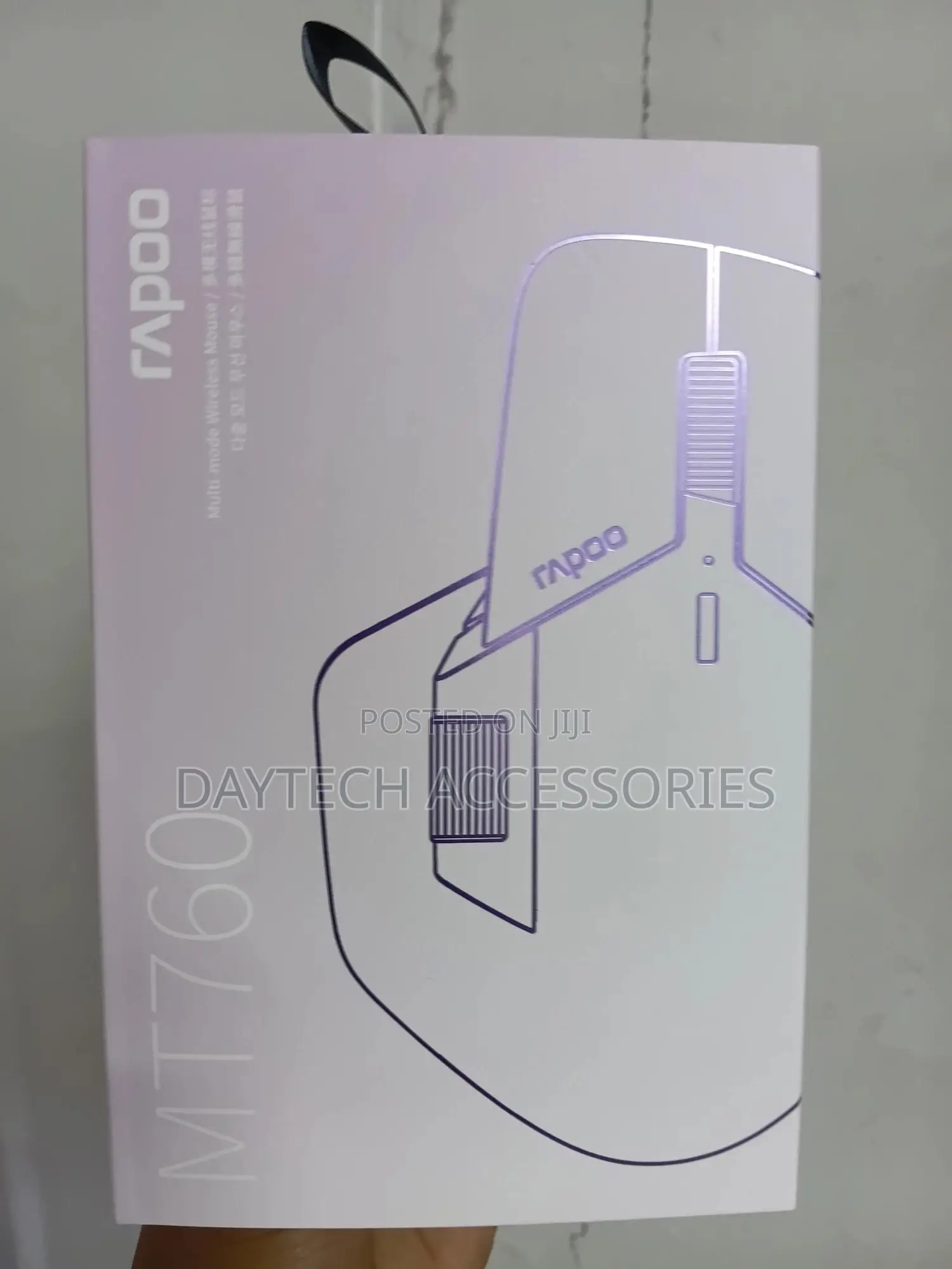 Rapoo Mt760l Multi-Device Wireless Mouse in White Packaging.