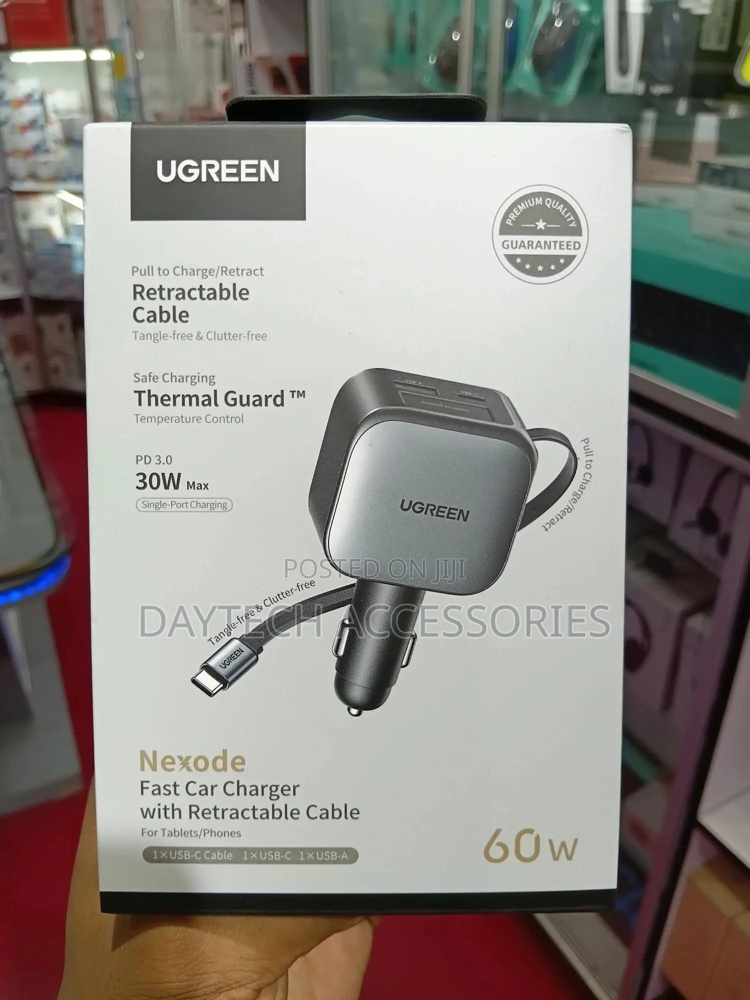 Ugreen 60w Nexode Fast Car Charger With a Retractable Cable.