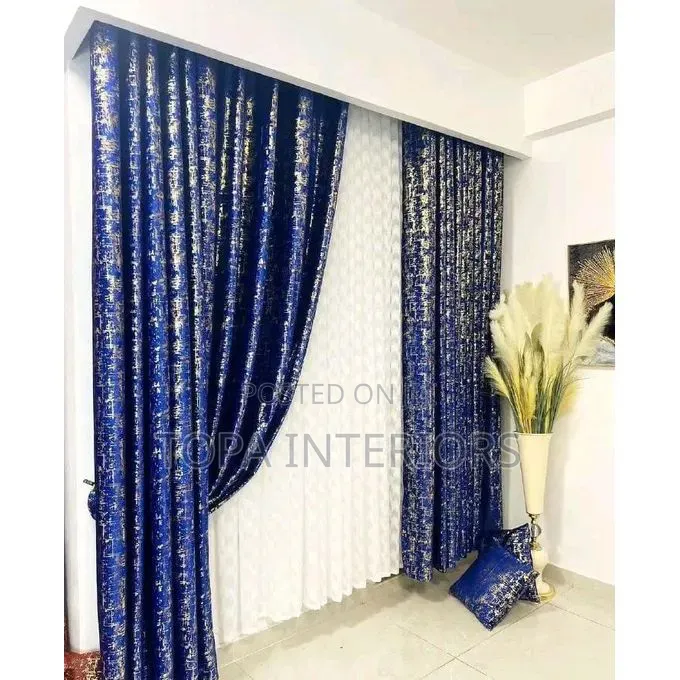 Glam Your Living Room Space With Classic Blue Velvet Curtains