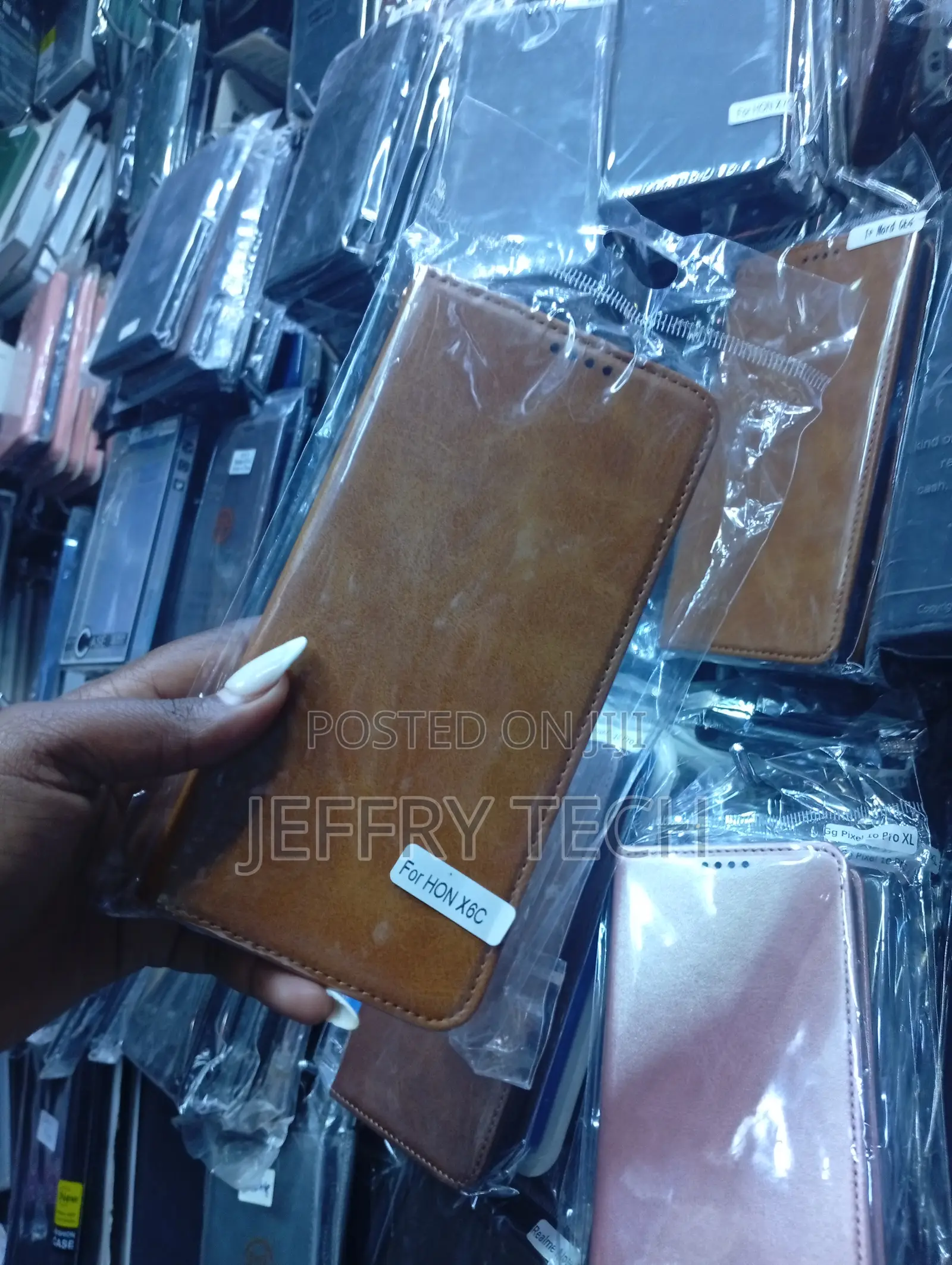 Brown Leather-Style Wallet Flip Case for the Honor X6c Smartphone.