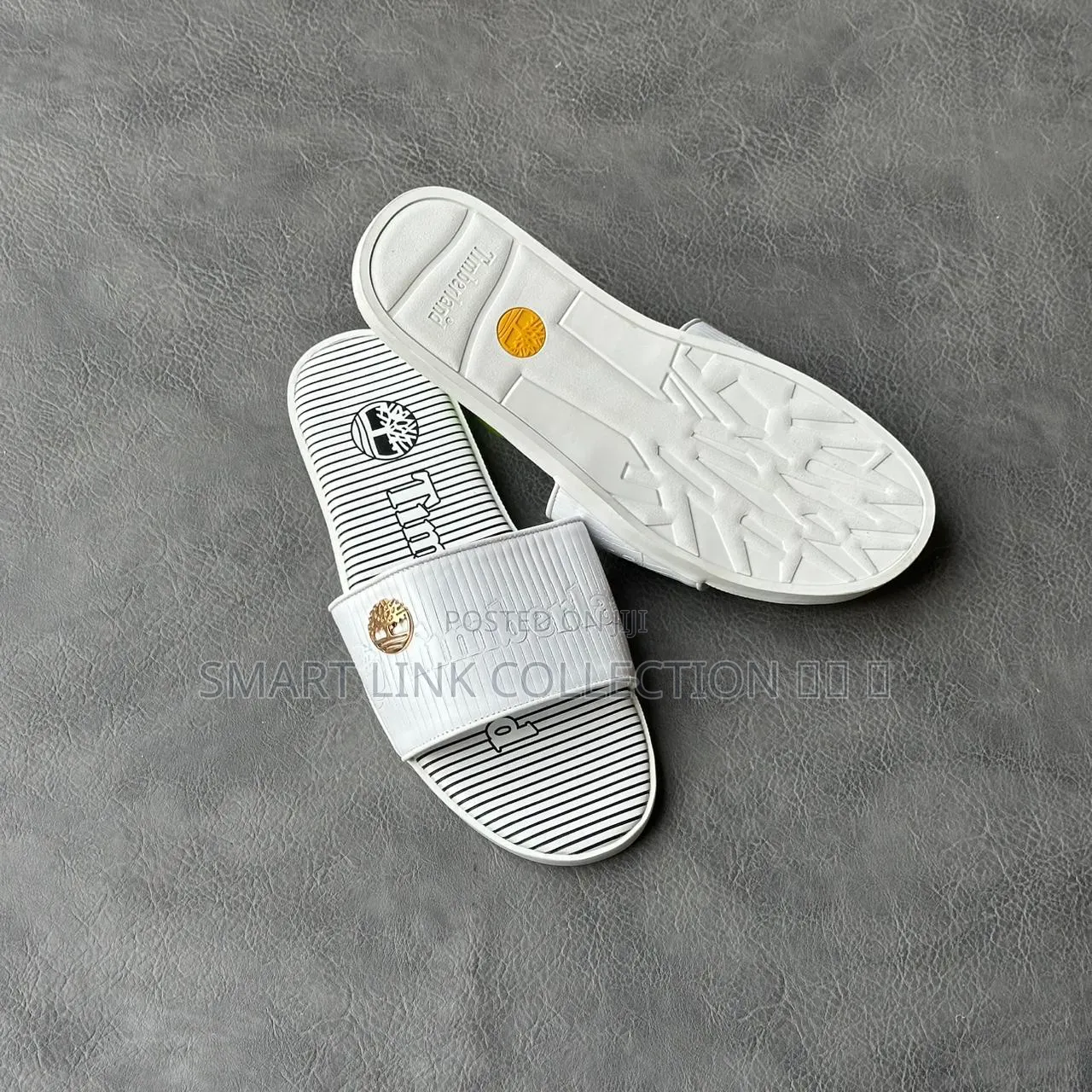 White Timberland Slides