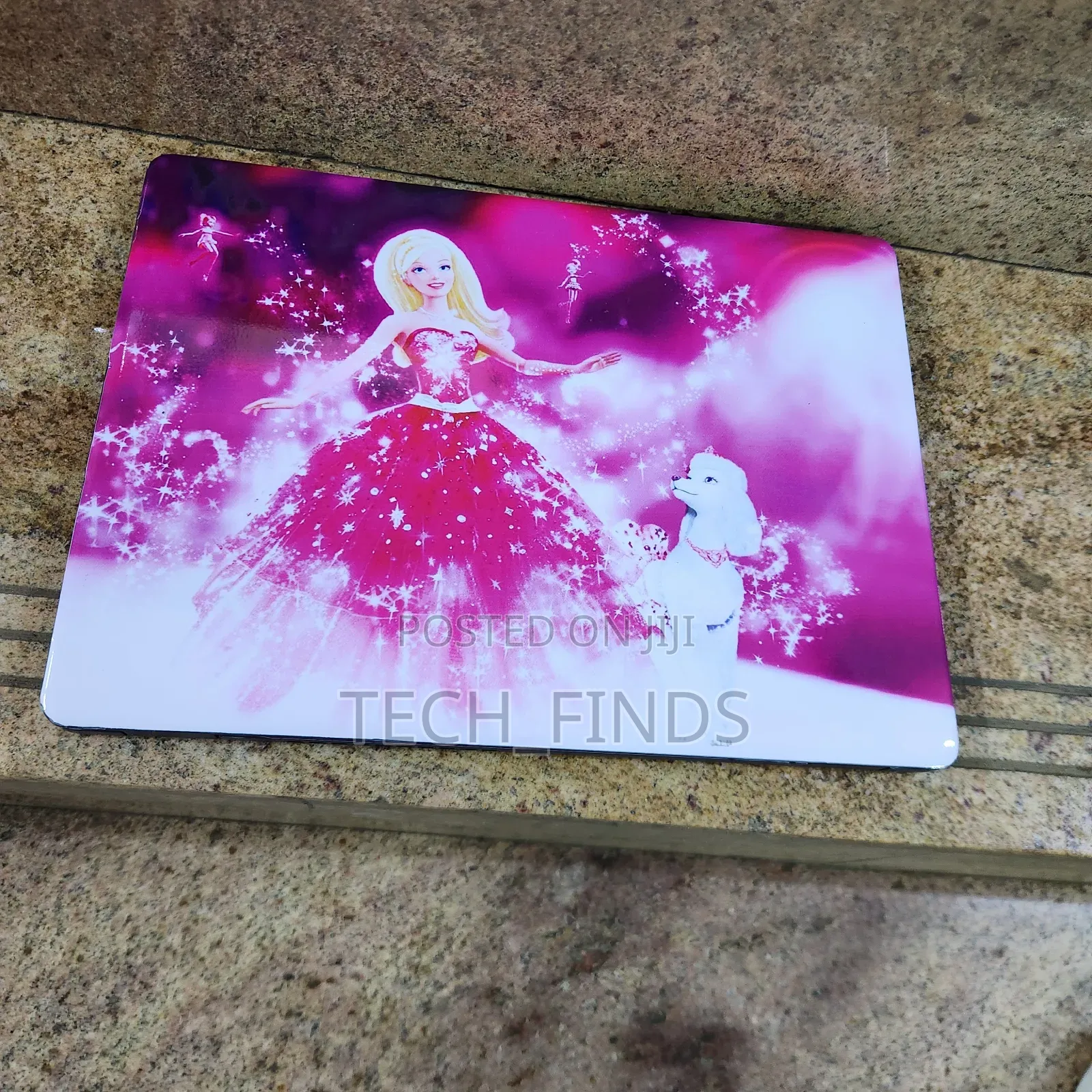 Vibrant Pink Barbie Themed Vinyl Laptop Skin.
