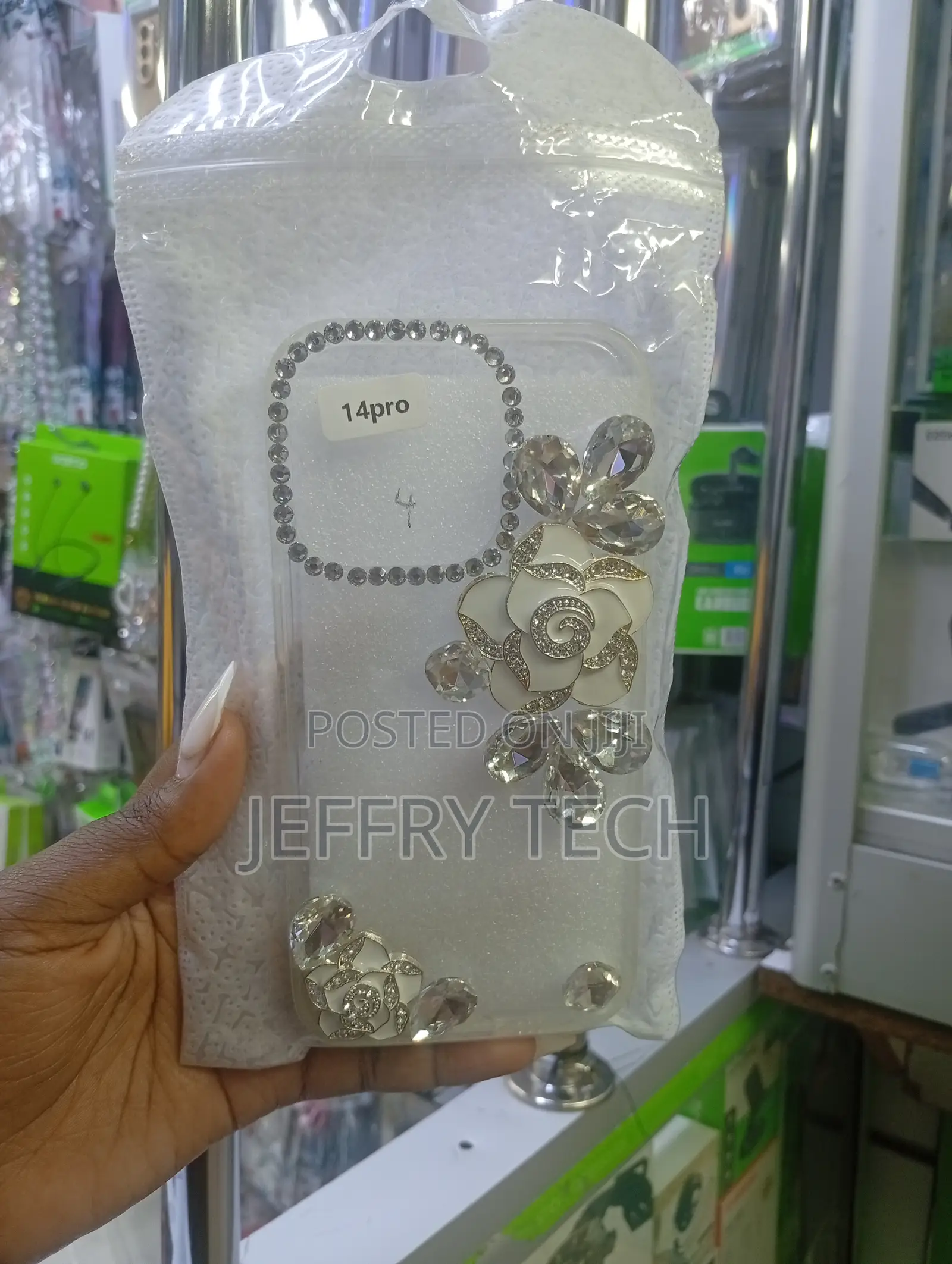 Rhinestone-Studded Phone Case Designed to Fit an iPhone 14 Pro.