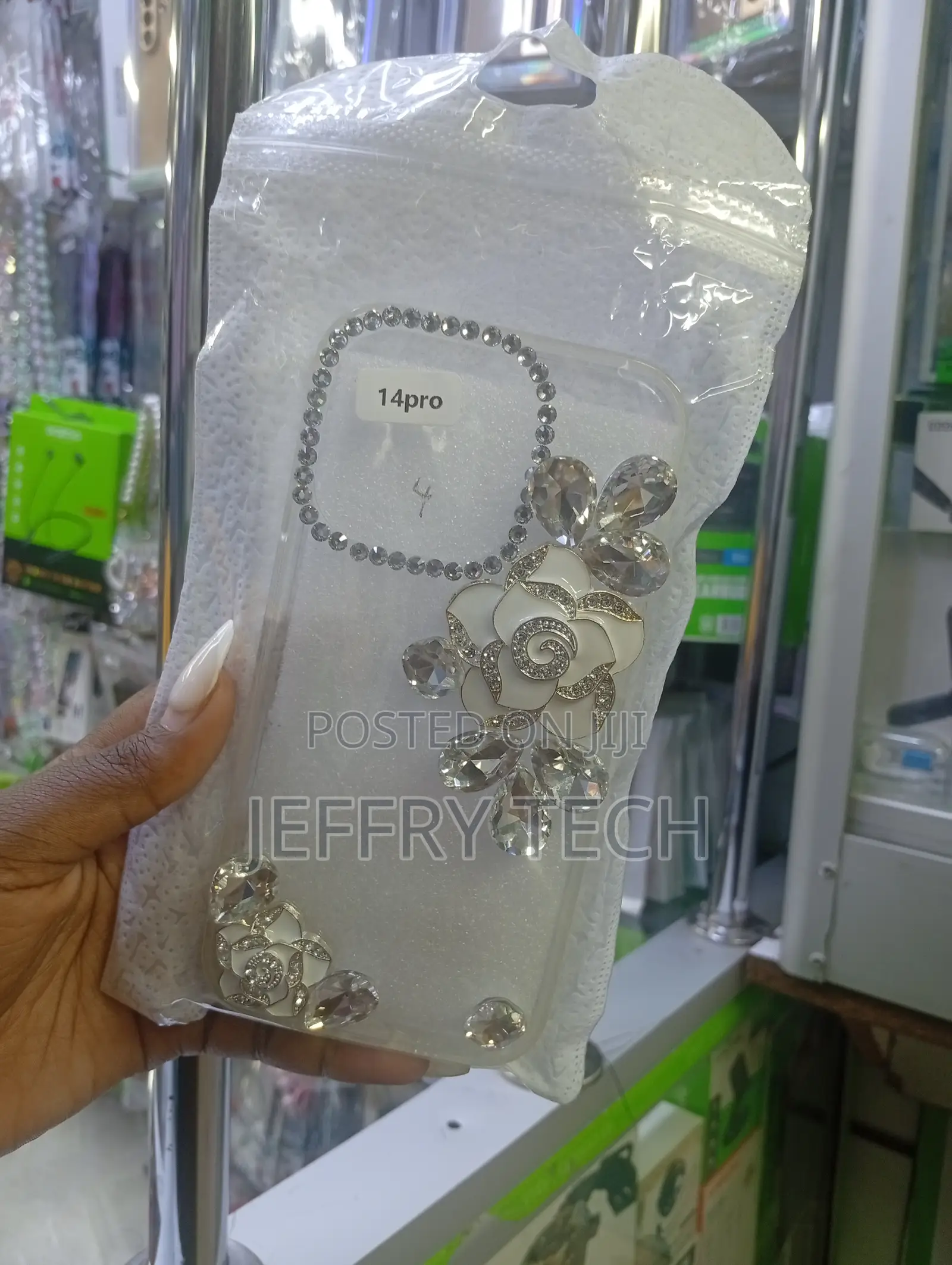 Rhinestone-Studded Phone Case Designed to Fit an iPhone 14 Pro.
