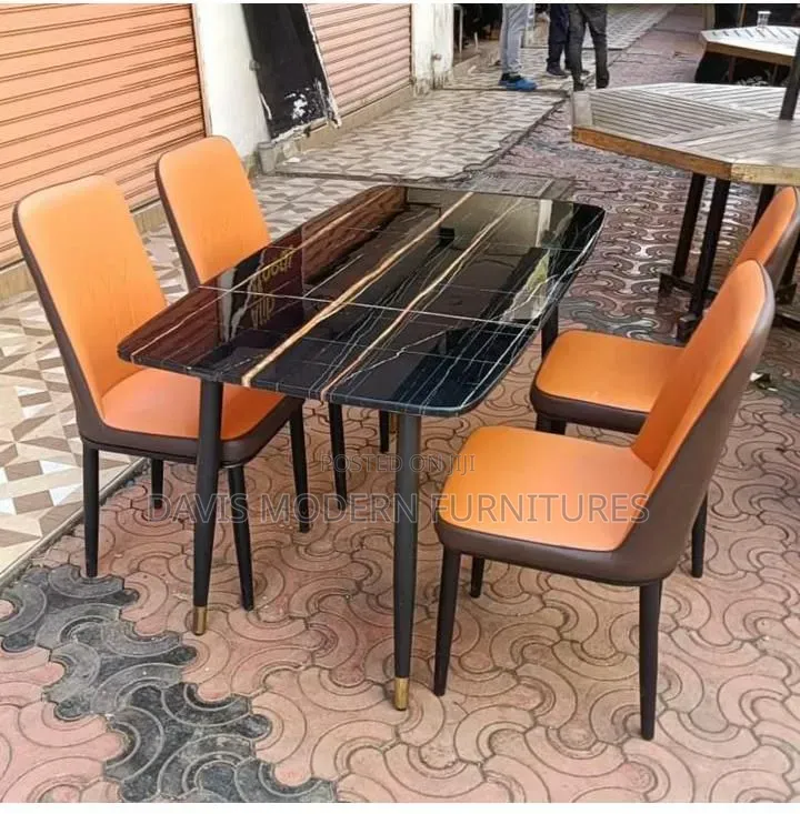 Dinning Set -Black-Effect Table With Two-Tone Orange and Brown Chairs