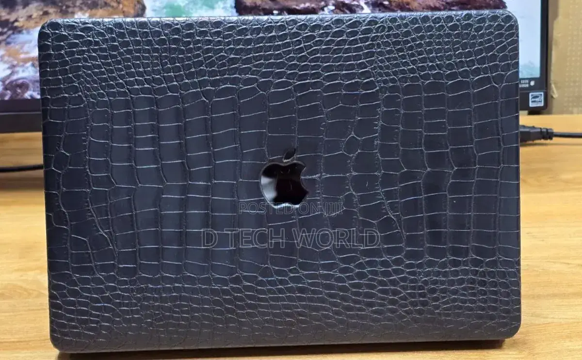 Macbook With Leather Finish Cases