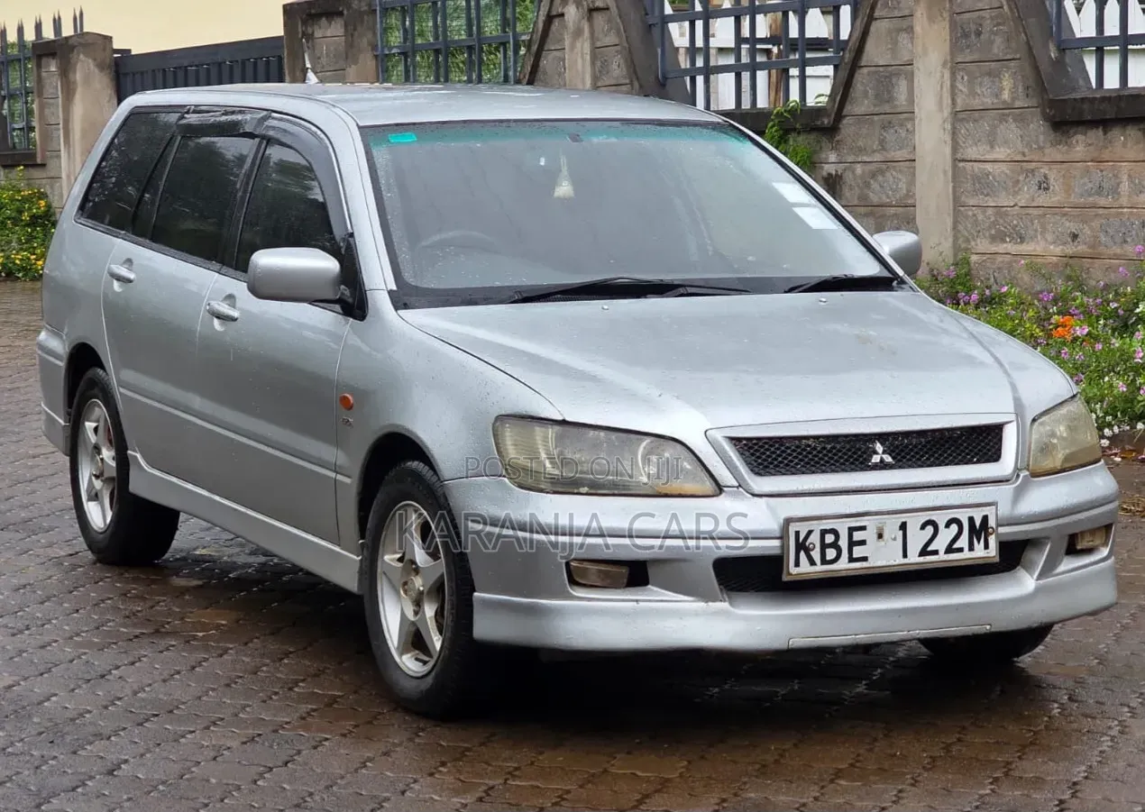 Mitsubishi Lancer Cedia OZ Rally 2004 Silver