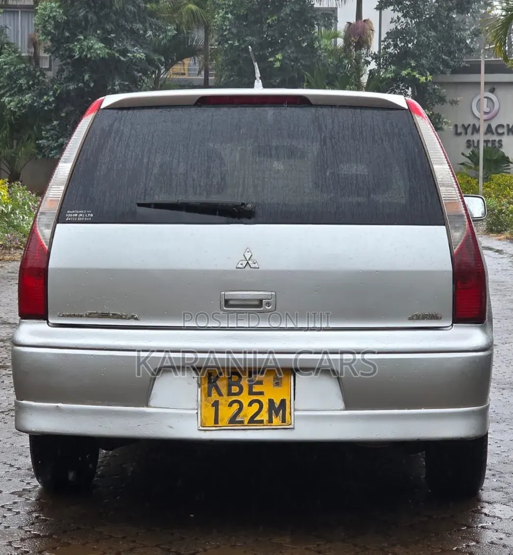 Mitsubishi Lancer Cedia OZ Rally 2004 Silver