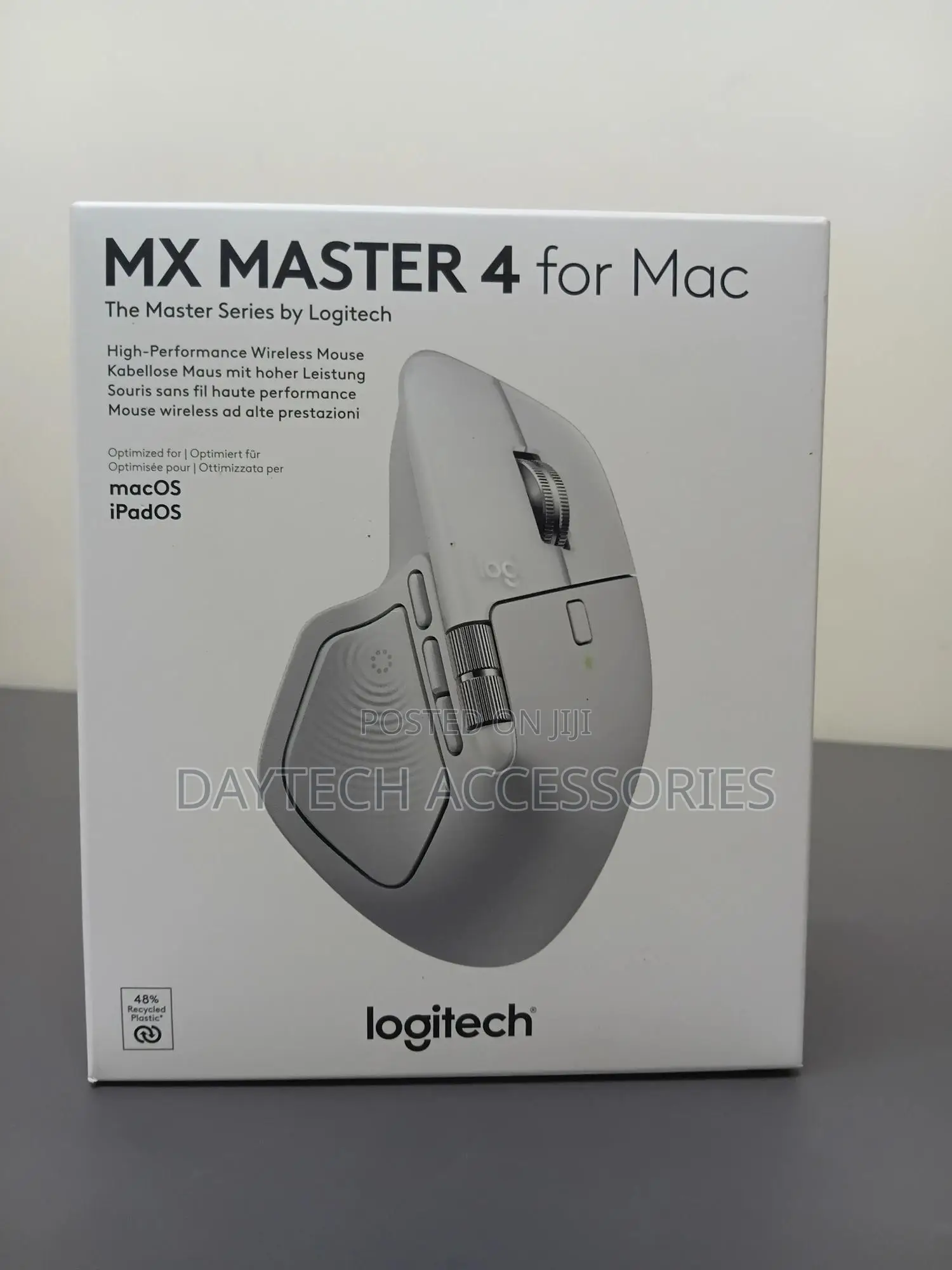 This Is a Logitech Mx Master 4 for Mac Wireless Mouse in Pale Gray.