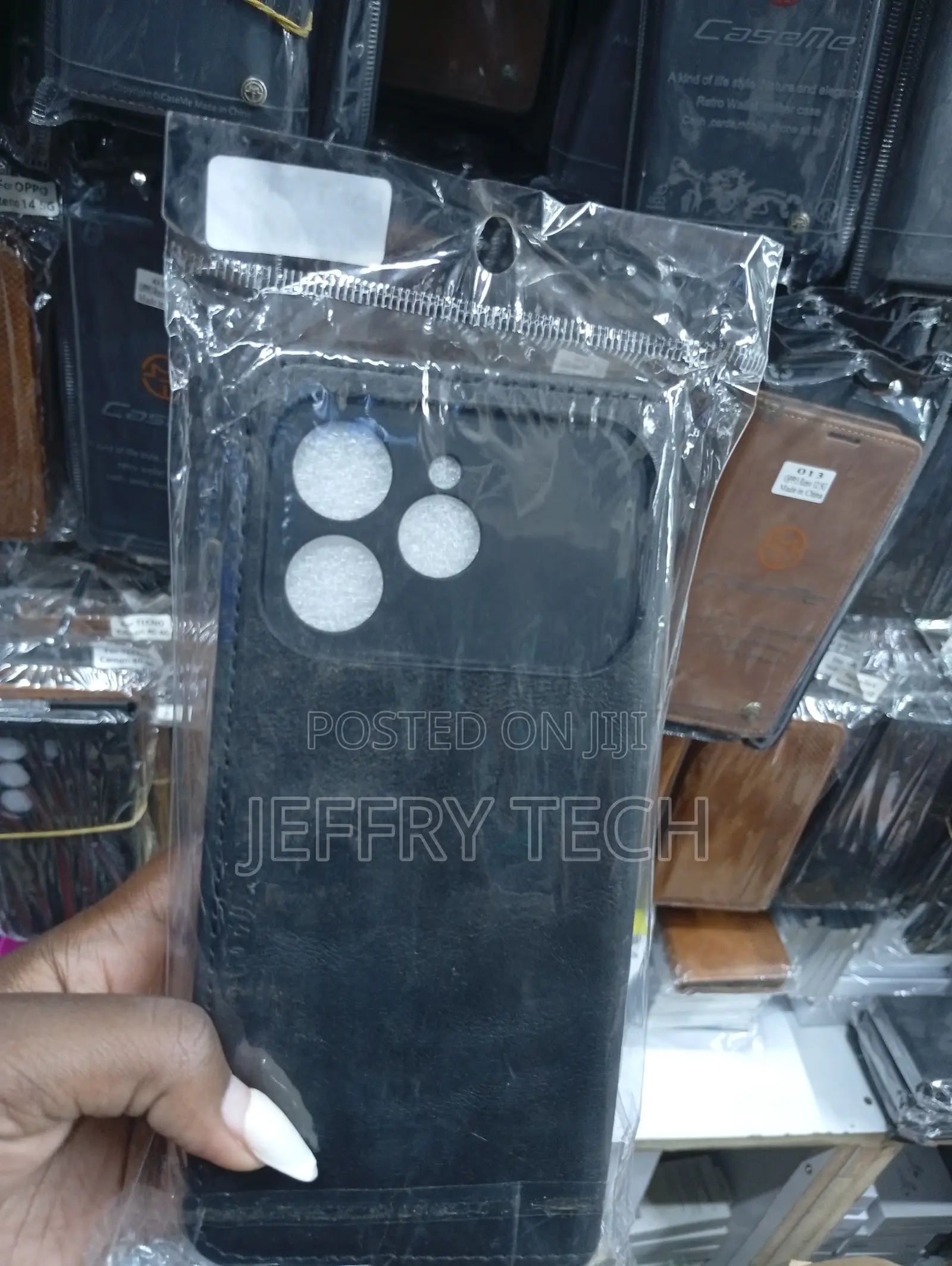 Black Faux-Leather Wallet Case for a Tecno Spark 40 Smartphone.