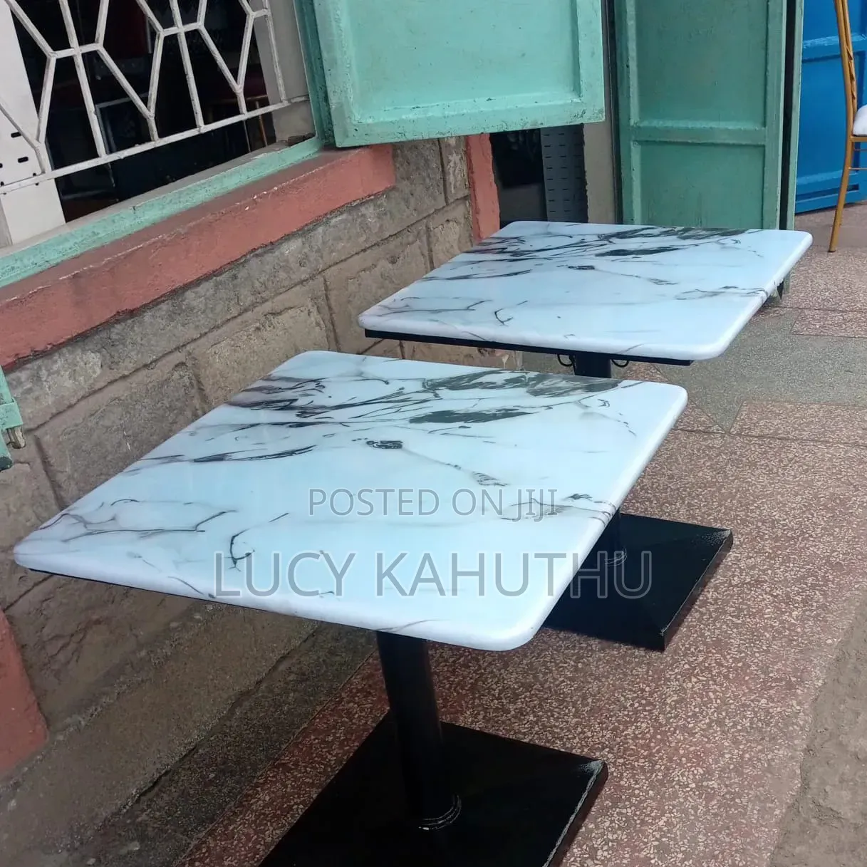 White Eboxy Tables With Hooks to Hang Handbags