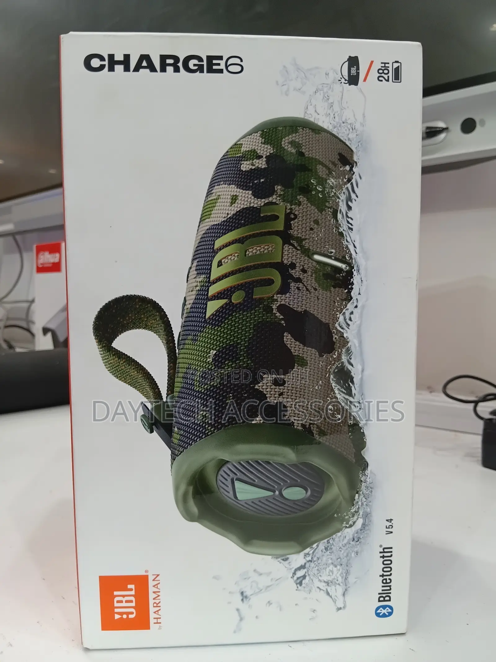 JBL Charge 6 Portable Bluetooth Speaker in a Camouflage Pattern.