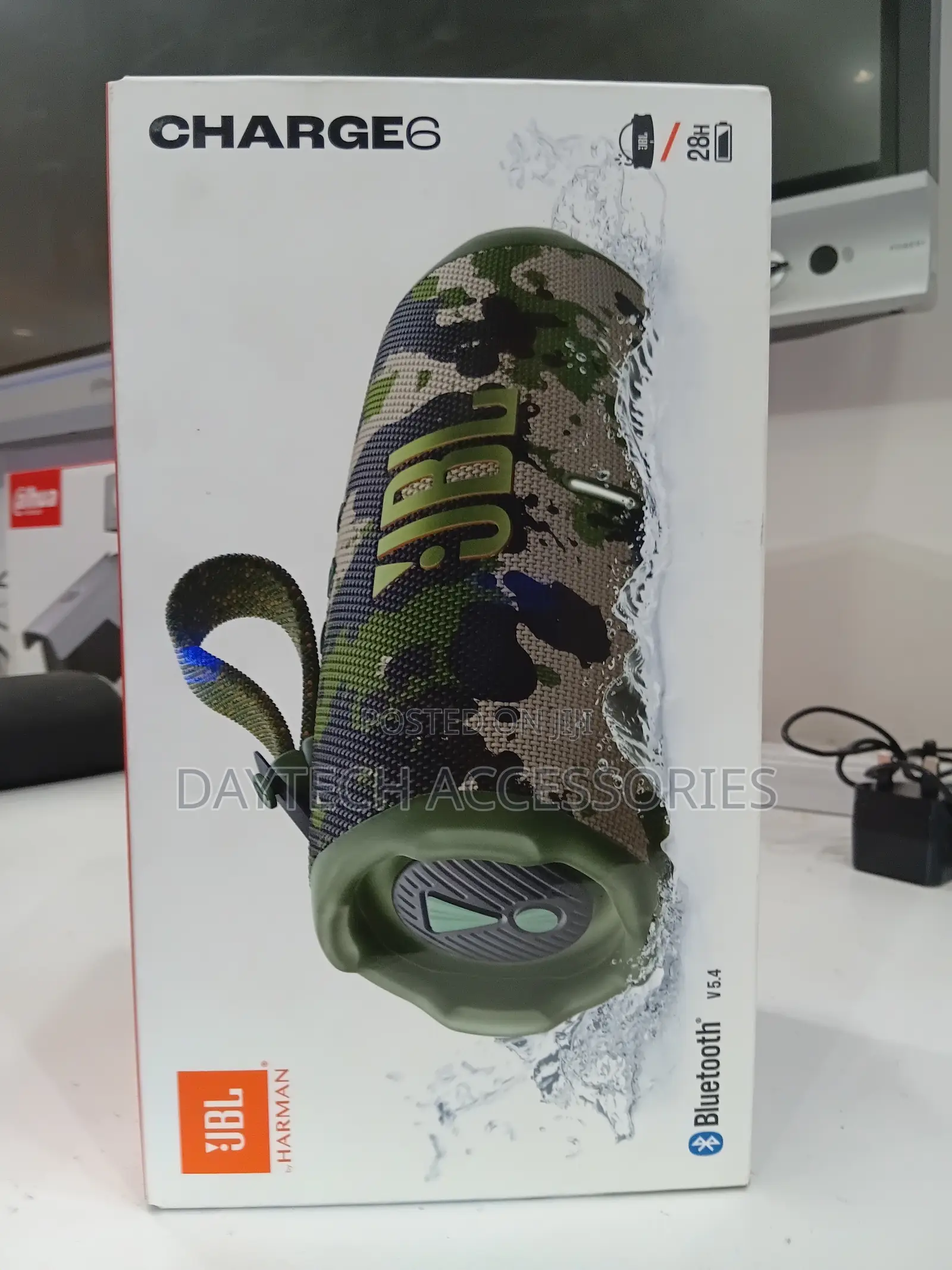 JBL Charge 6 Portable Bluetooth Speaker in a Camouflage Pattern.