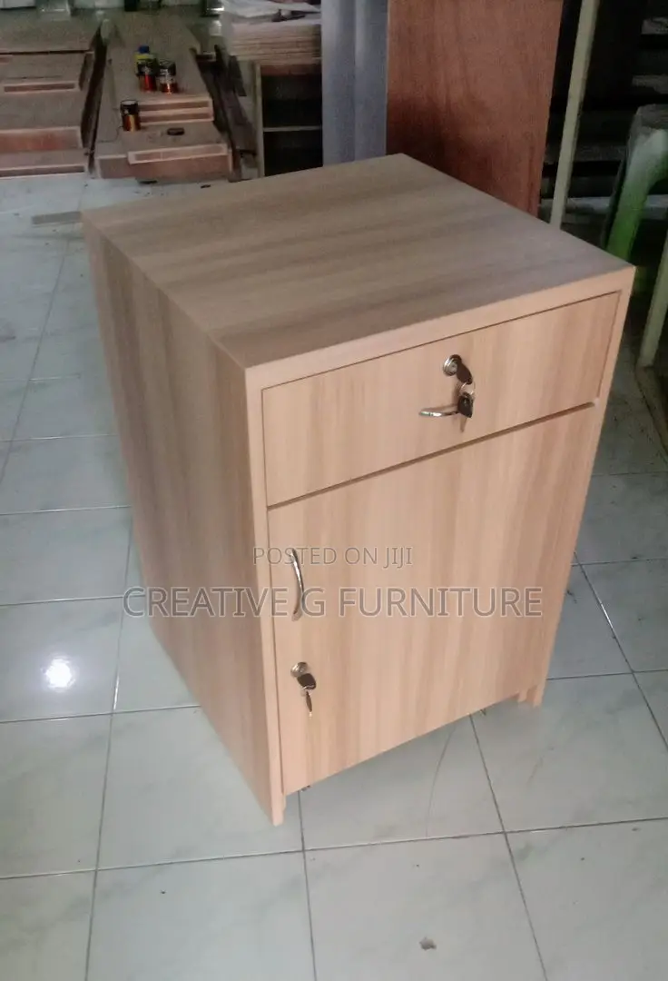 Light Wood Mobile Cabinet With Drawer Door