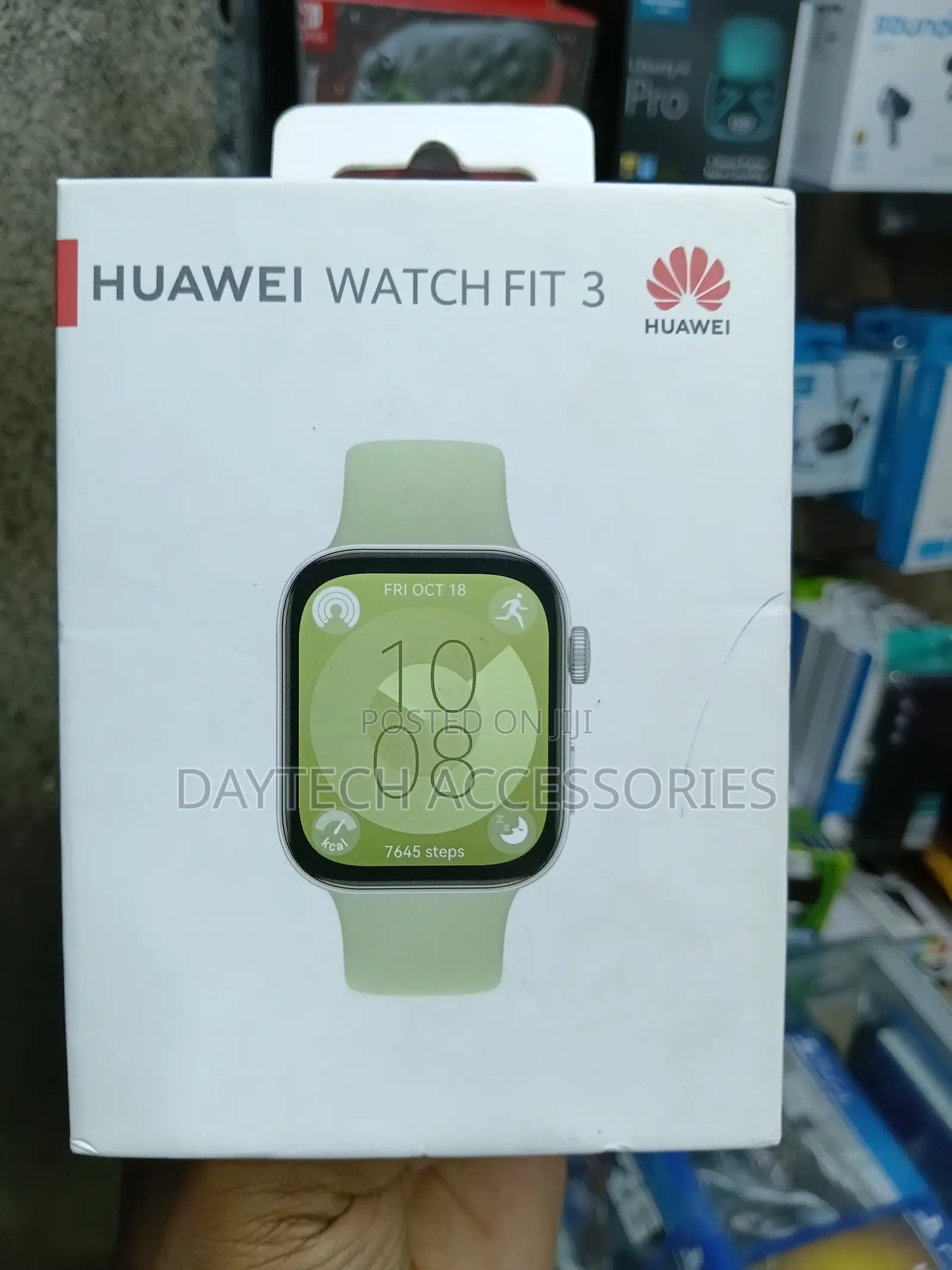 This Is a Huawei Watch Fit 3 With a Green Strap.