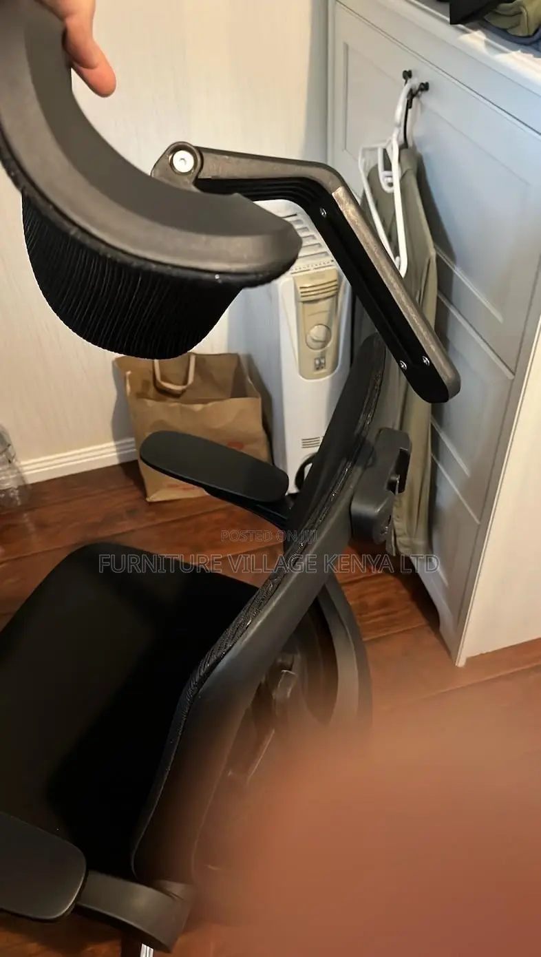 Office Chair: Ergonomic Office Chair With Flip-Up Arms.