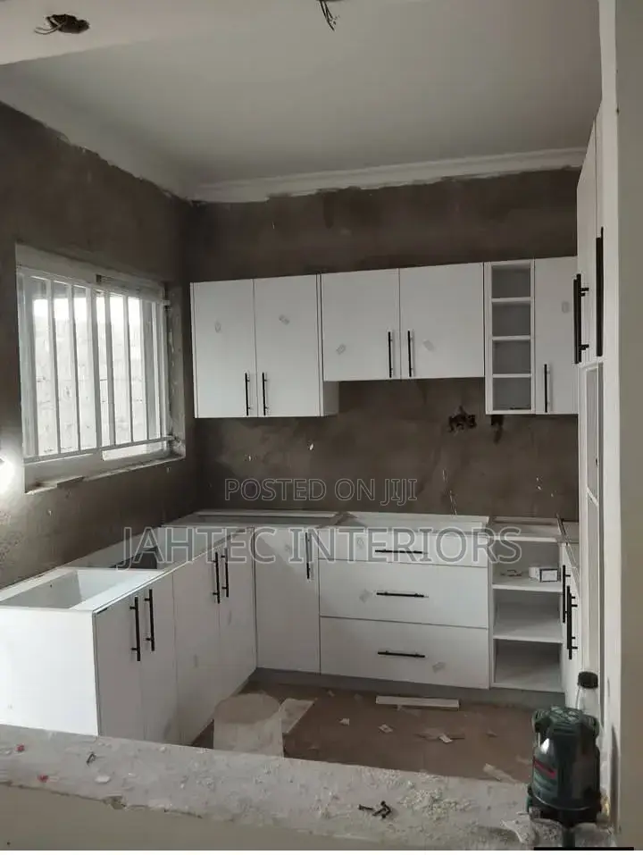 Repairs for Kitchen Cabinets and Fitting Work